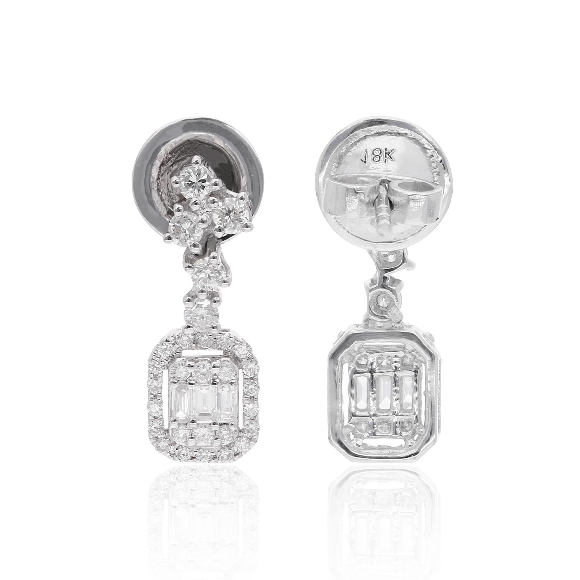 Elevate your style with these stunning handmade dangle earrings, showcasing a captivating combination of baguette and round-cut diamonds set in 18-karat white gold. These earrings are a true embodiment of fine jewelry craftsmanship and exquisite