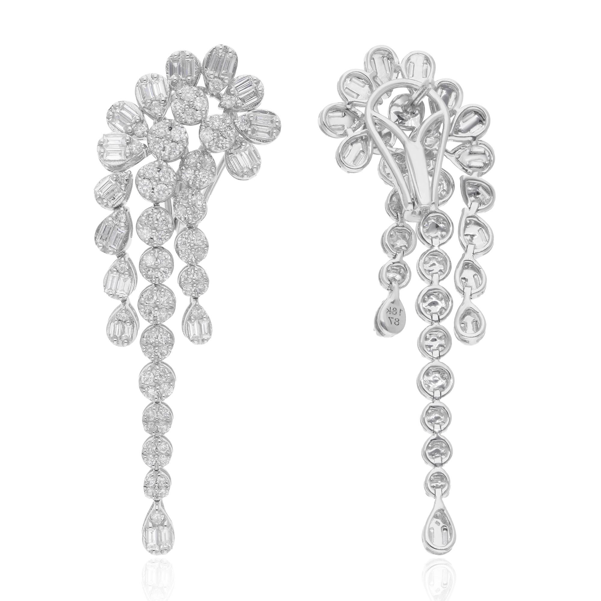 Elevate your style with the timeless elegance of these Baguette & Round Diamond Dangle Earrings, expertly handcrafted in 18 karat white gold. Designed to captivate, each earring features a mesmerizing combination of baguette and round diamonds,