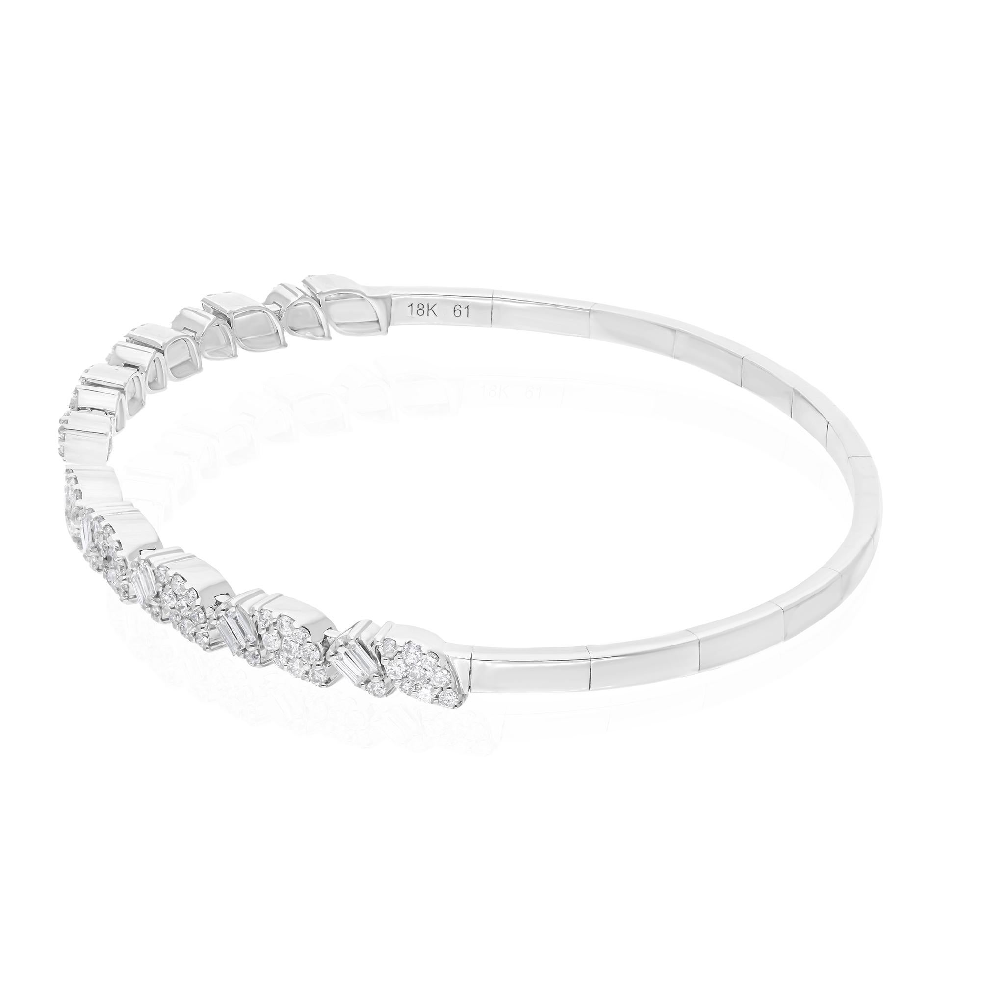 Cast from 14-karat gold, these exquisite bangle is handset with 1.26 carats of sparkling diamonds.

FOLLOW SPECTRUM JEWELS storefront to view the latest collection & exclusive pieces. Spectrum Jewels is proudly rated as a Top Seller on 1stdibs with