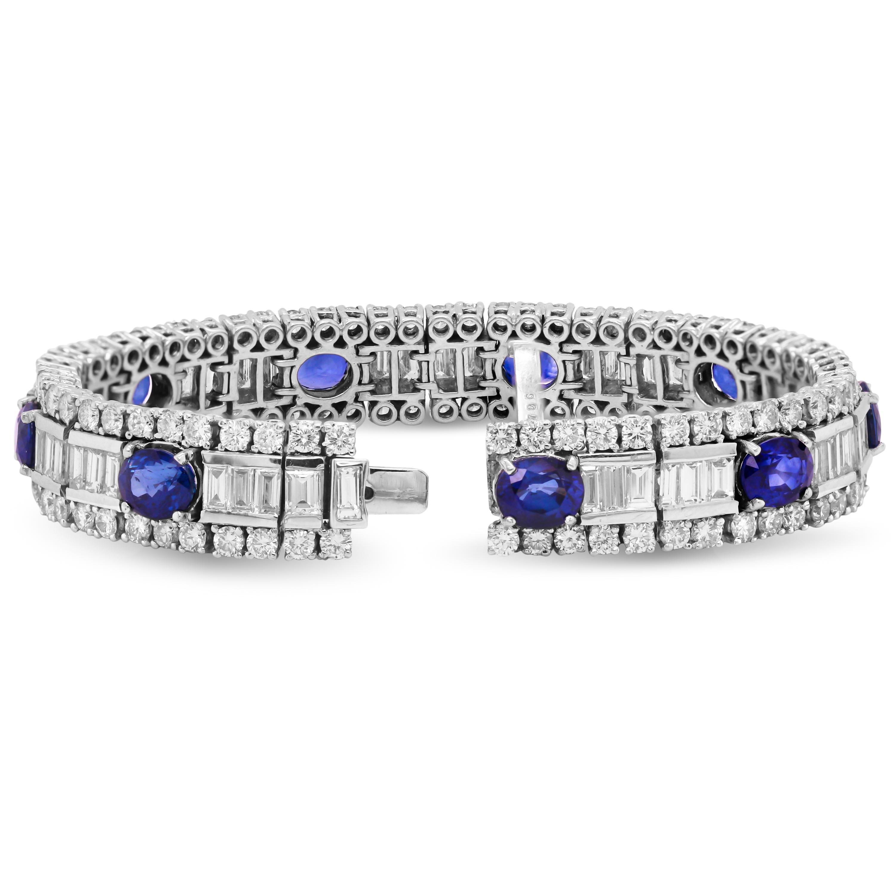 18K White Gold Tennis Bracelet with Baguette and Round Diamonds and Oval Blue Sapphires

This stunning bracelet features eight oval blue sapphires with baguette and round diamonds all throughout. The diamond and sapphire weights are hallmarked near