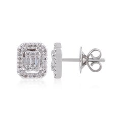 Orecchini con diamanti tondi e baguette in oro bianco 18 carati, realizzati a mano.