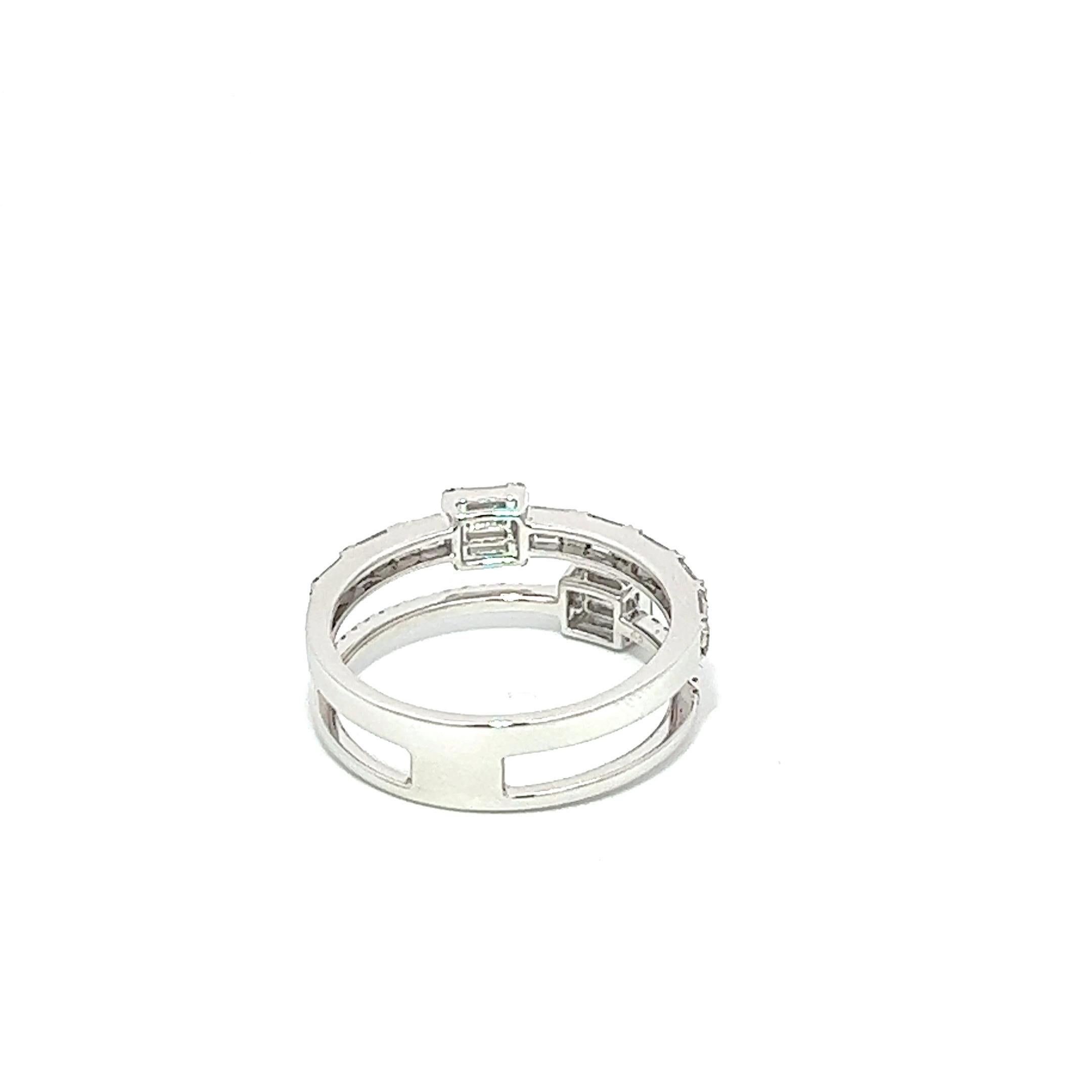 Baguette & Round Diamonds 18KW Gold Setiing Ladie's Ring perfect for a special occasion, to show your love one how much you love them.

18KW  3.31Grams
28BD  0.43CT
48RD  0.20CT