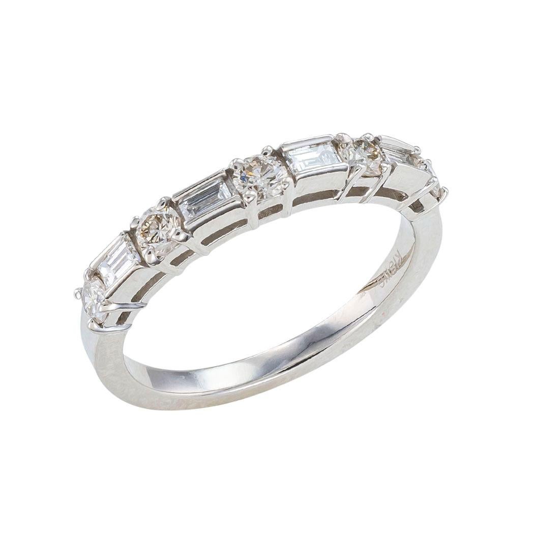 Baguette, round brilliant-cut diamonds, and white gold half eternity ring circa 1990.

We are here to connect you with beautiful and affordable estate and vintage jewelry.

Clear and concise information you want to know is listed below.  Contact us
