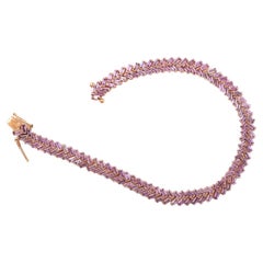 Pulsera de zafiro rosa en forma de baguette de oro rosa de 14k