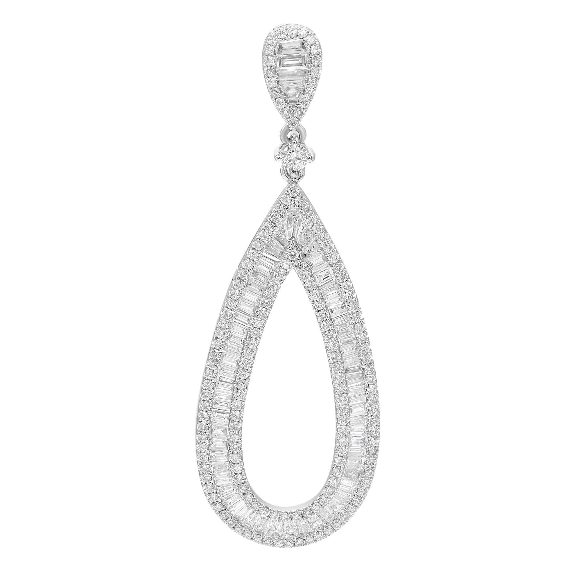 These exemplary earrings mounted in 18k white gold add a touch of elegance and sophistication to any outfit. Featuring, channel set baguette cut and pave set round cut diamonds weighing 3.31 carats. Diamond quality: color G-H and clarity VS-SI. A
