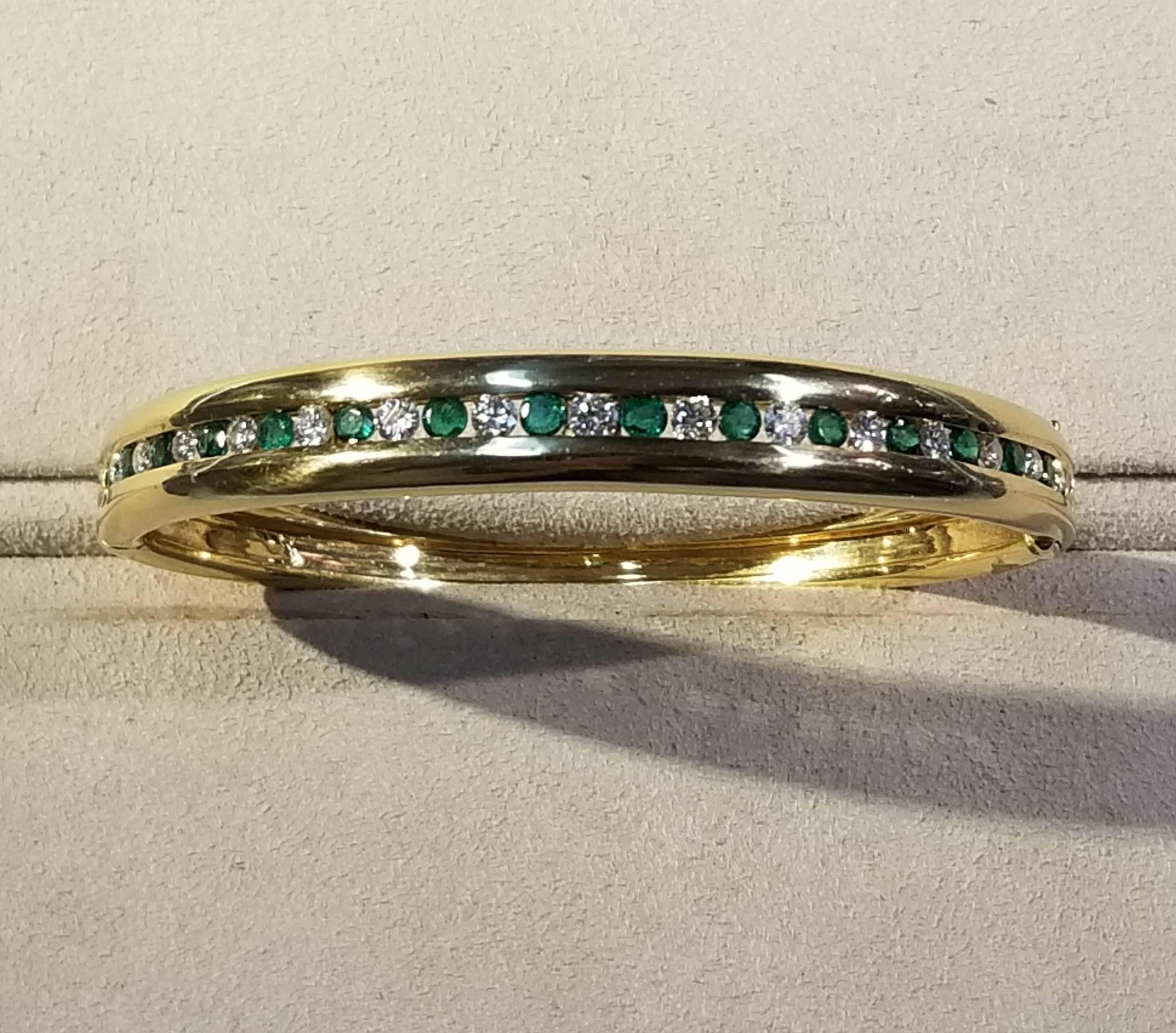Bailey Banks and Biddle 18k y/g Emerald and Diamond Bracelet.
There are 15 Round Brilliant Diamonds that are GHI in color and SI/I in clarity. The actual total weight comes to 1 cts. There are 16 Round D Emeralds from Medium to Light Inclusions in
