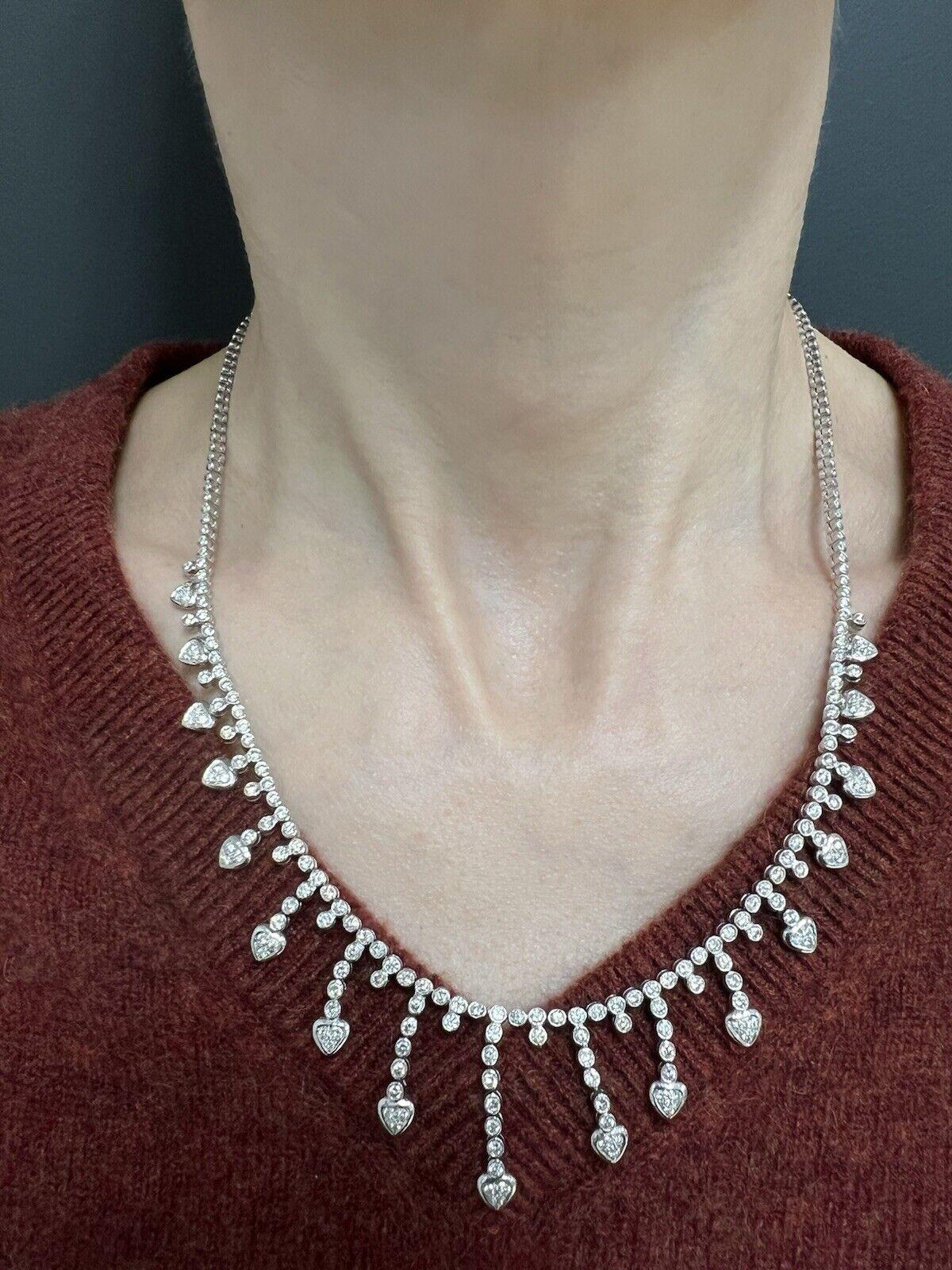 Bailey Banks & Biddle 18k White Gold & Diamond Heart Necklace w/Pouch, Appraisal & Box

Here is your chance to purchase a beautiful and highly collectible designer necklace.  

Highly collectible and well-made vintage Bailey Banks & Biddle diamond