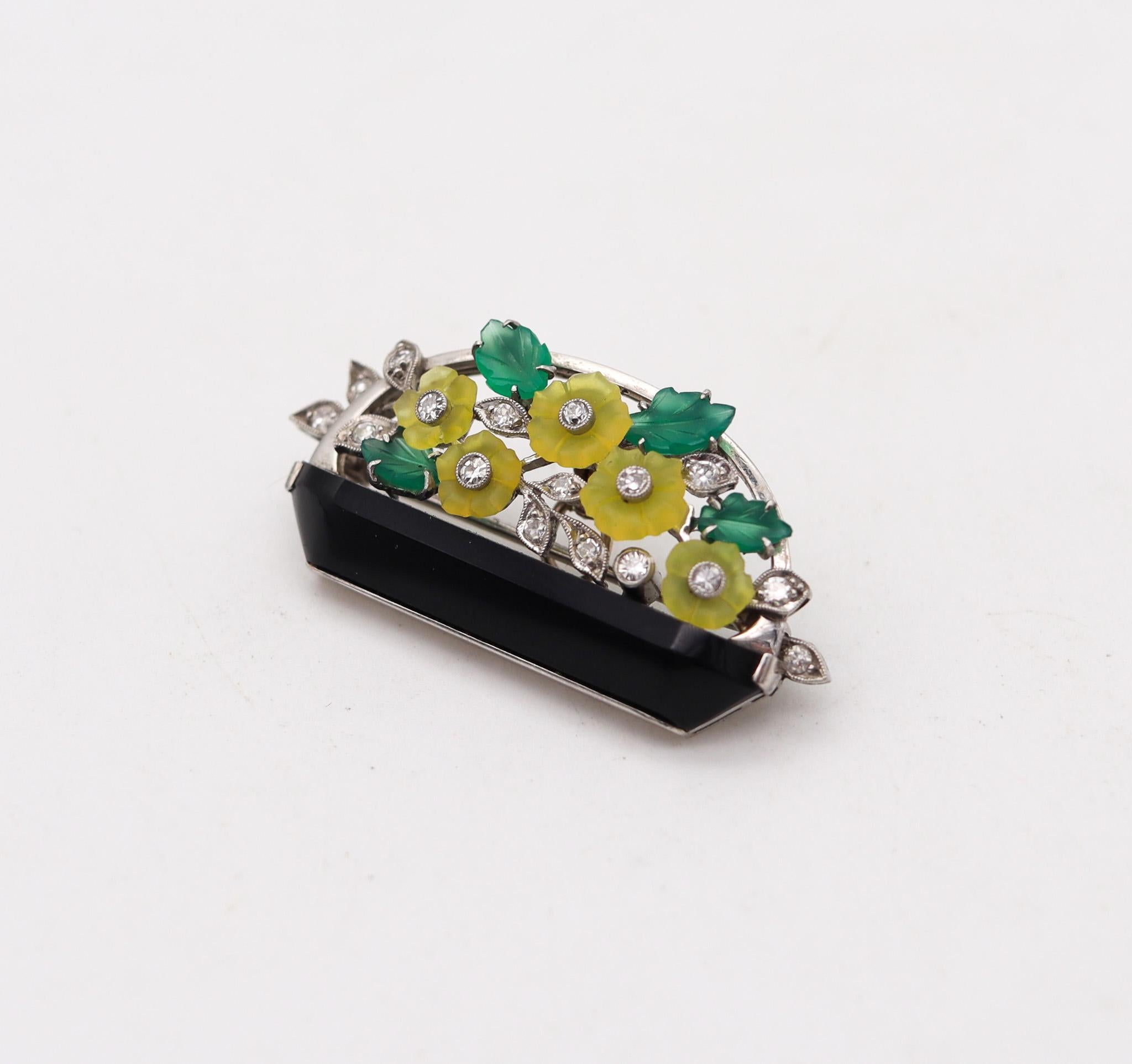 Art deco jardinière brooch designed by Bailey Banks & Biddle.

An exquisite jardinière pendant-brooch created by Bailey Banks & Biddle, during the glorious American art deco period, circa 1925. This amazing piece scream art deco with its old