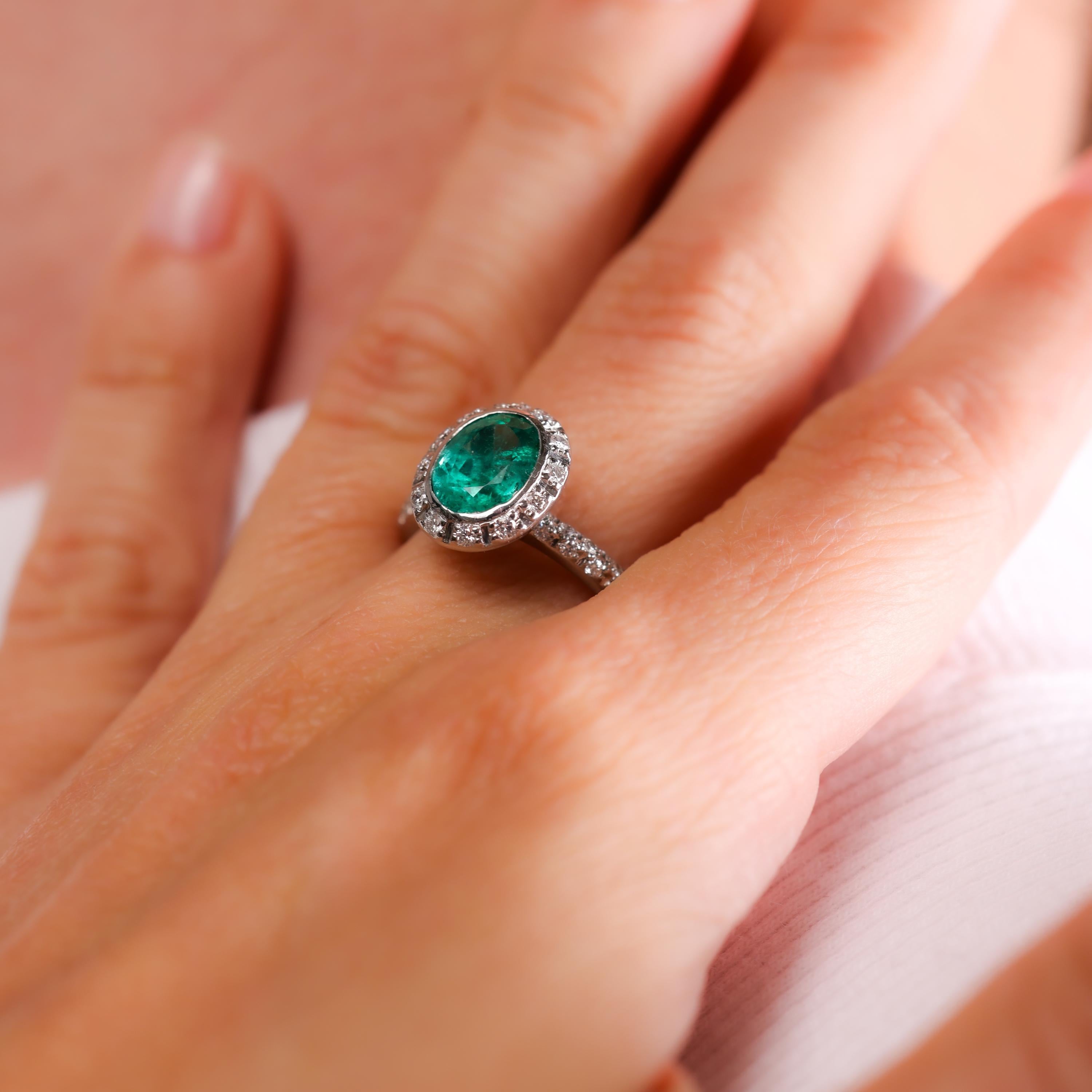 Oval Cut Bailey Banks & Biddle 2.05 carat emerald diamond 18k white gold cluster ring