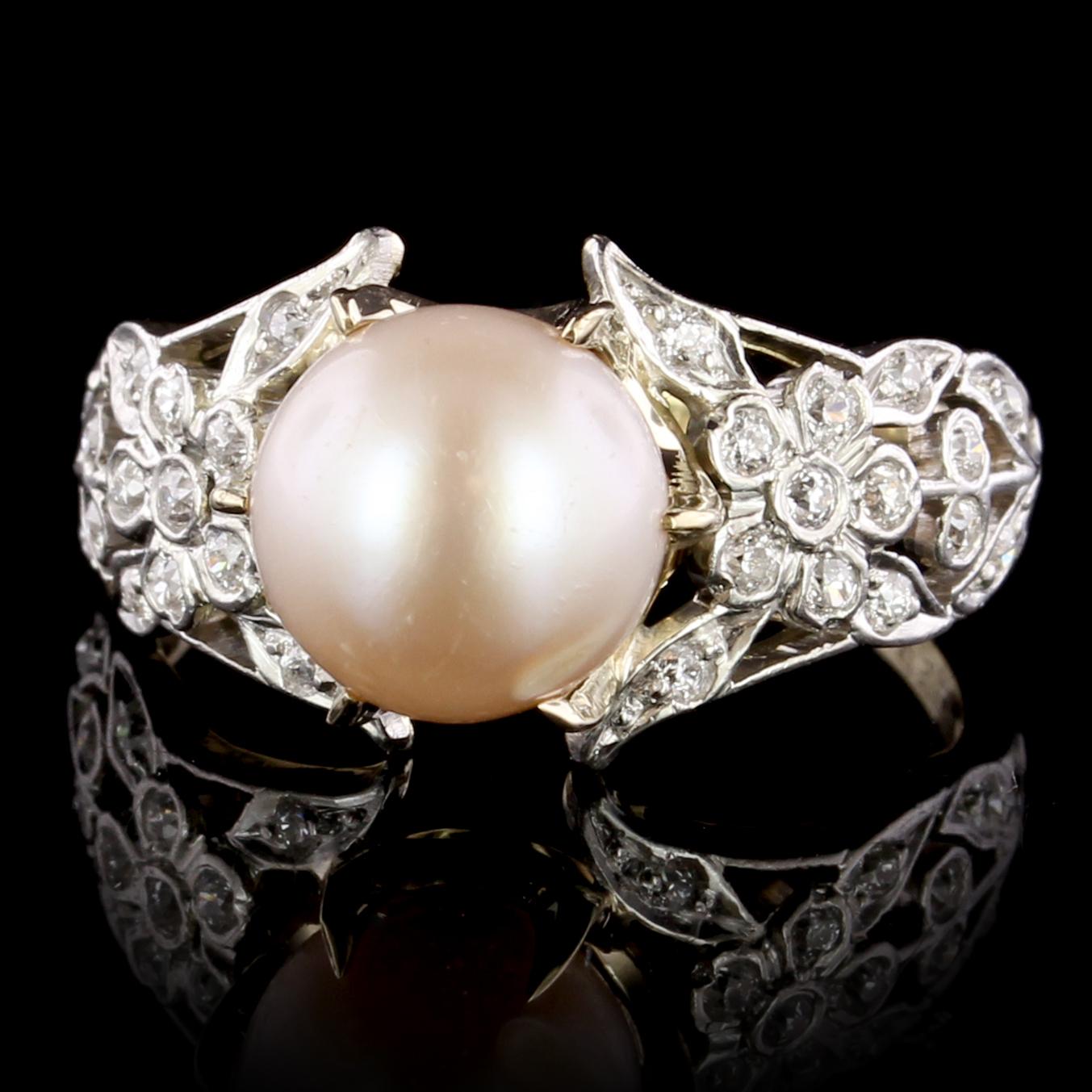 Bailey, Banks & Biddle Edwardian Natural Freshwater Pearl and Diamond Ring . The ring is set
with one natural freshwater pearl measuring 9.52 x 9.16mm., GIA #2201498044,
stating that the pearl is natural freshwater, further set with 28 old mine cut