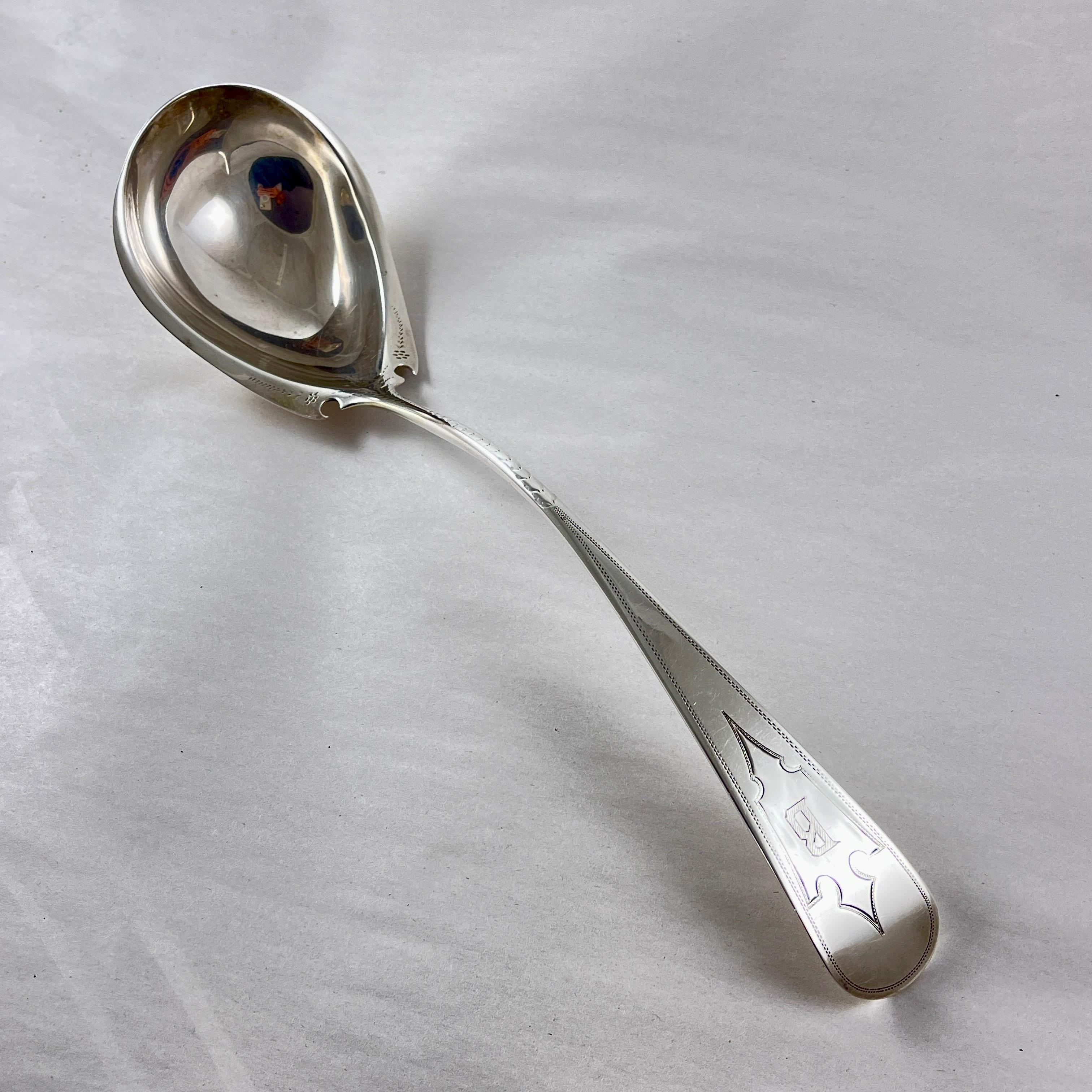 A Sterling Silver ladle, hand made by Bailey & Co., Philadelphia, circa 1850.

Bailey & Company, a forerunner to the famed silversmiths, Bailey, Banks & Biddle, operated in Philadelphia from 1848-1878.

The heavy ladle shows a beautifully formed