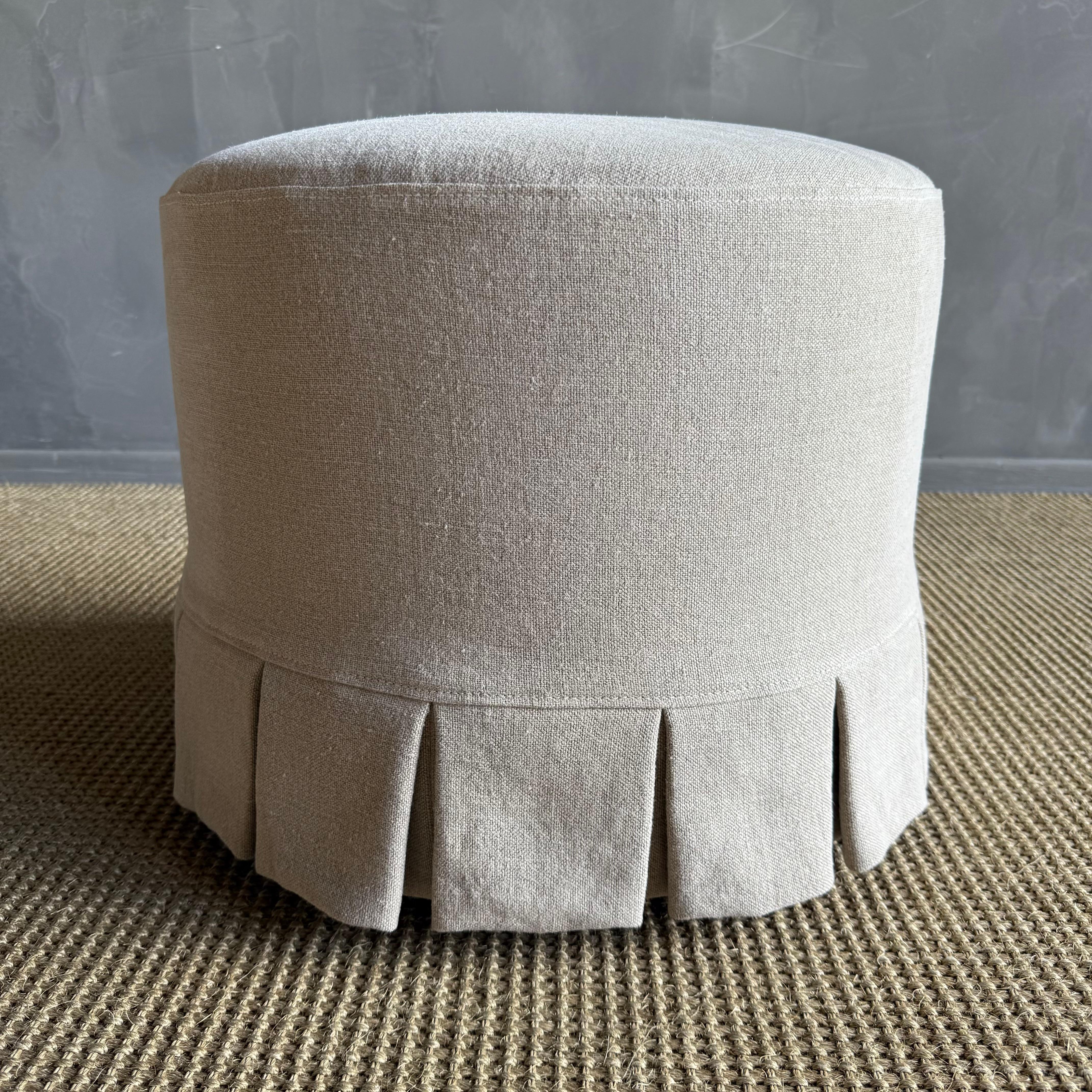 Introducing the Bailey Round Ottoman with Slip Cover

Our Bailey ottoman is upholstered in a sophisticated heavy weight hemp fabric with X pattern stitching, this ottoman is versatile and stylish. We have added a slip cover in the heavy stone washed