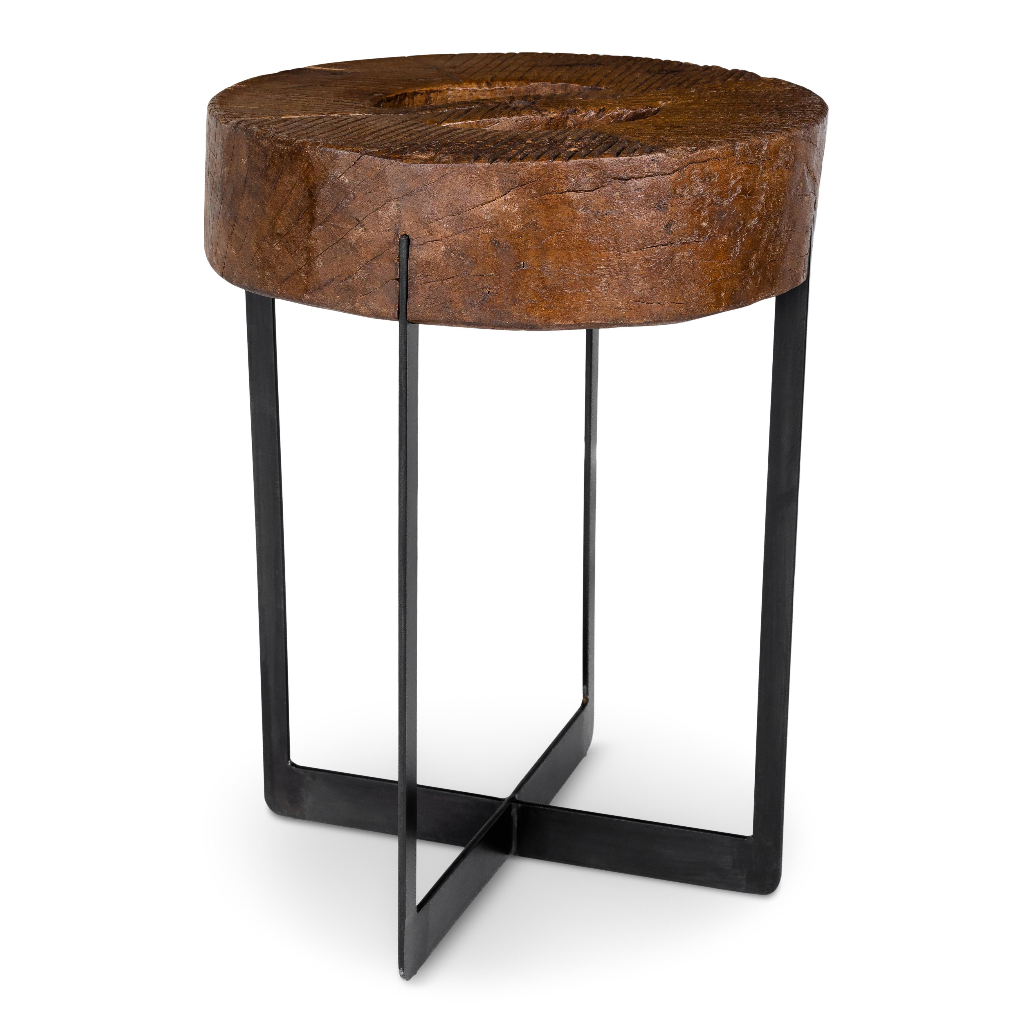 Bailhese wooden mill wheel on ebony patina steel base offers great texture, coloring, and a rustic industrial feel. 

This piece is a part of Brendan Bass’s one-of-a-kind collection, Le Monde. French for “The World”, the Le Monde collection is made
