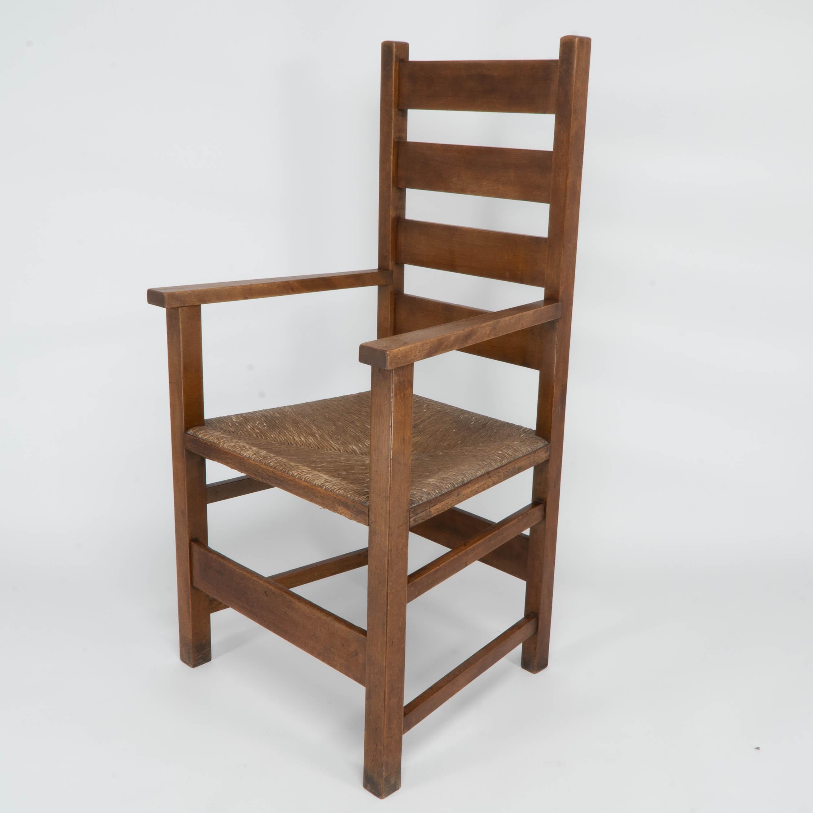 Arts and Crafts Baillie Scott for J P White. Arts & Crafts oak & rush seat ladder back armchair. For Sale