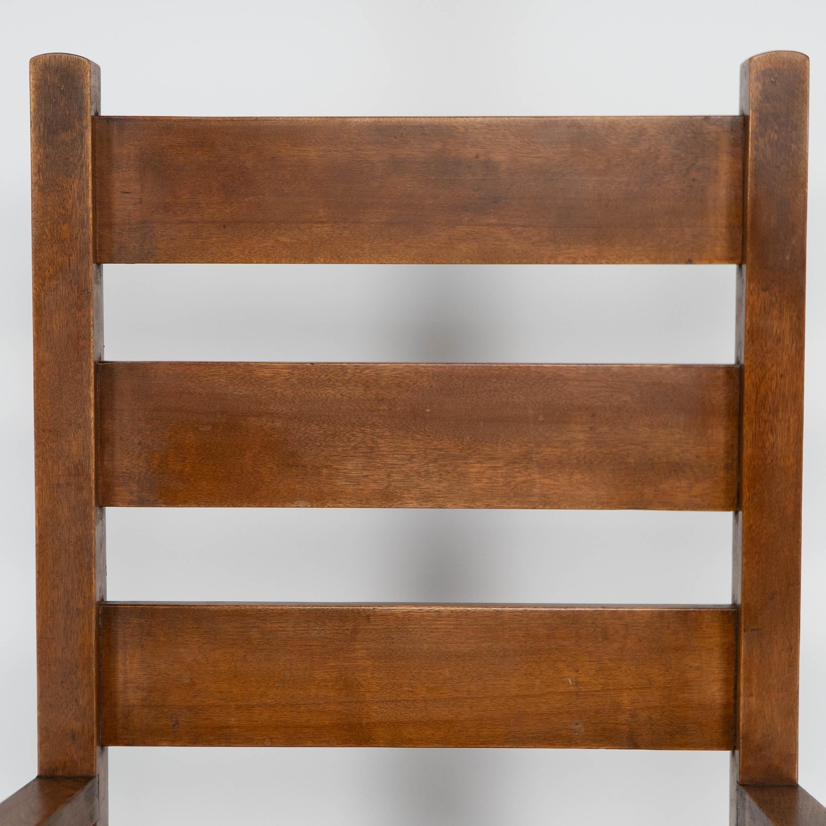 Early 20th Century Baillie Scott for J P White. Arts & Crafts oak & rush seat ladder back armchair. For Sale