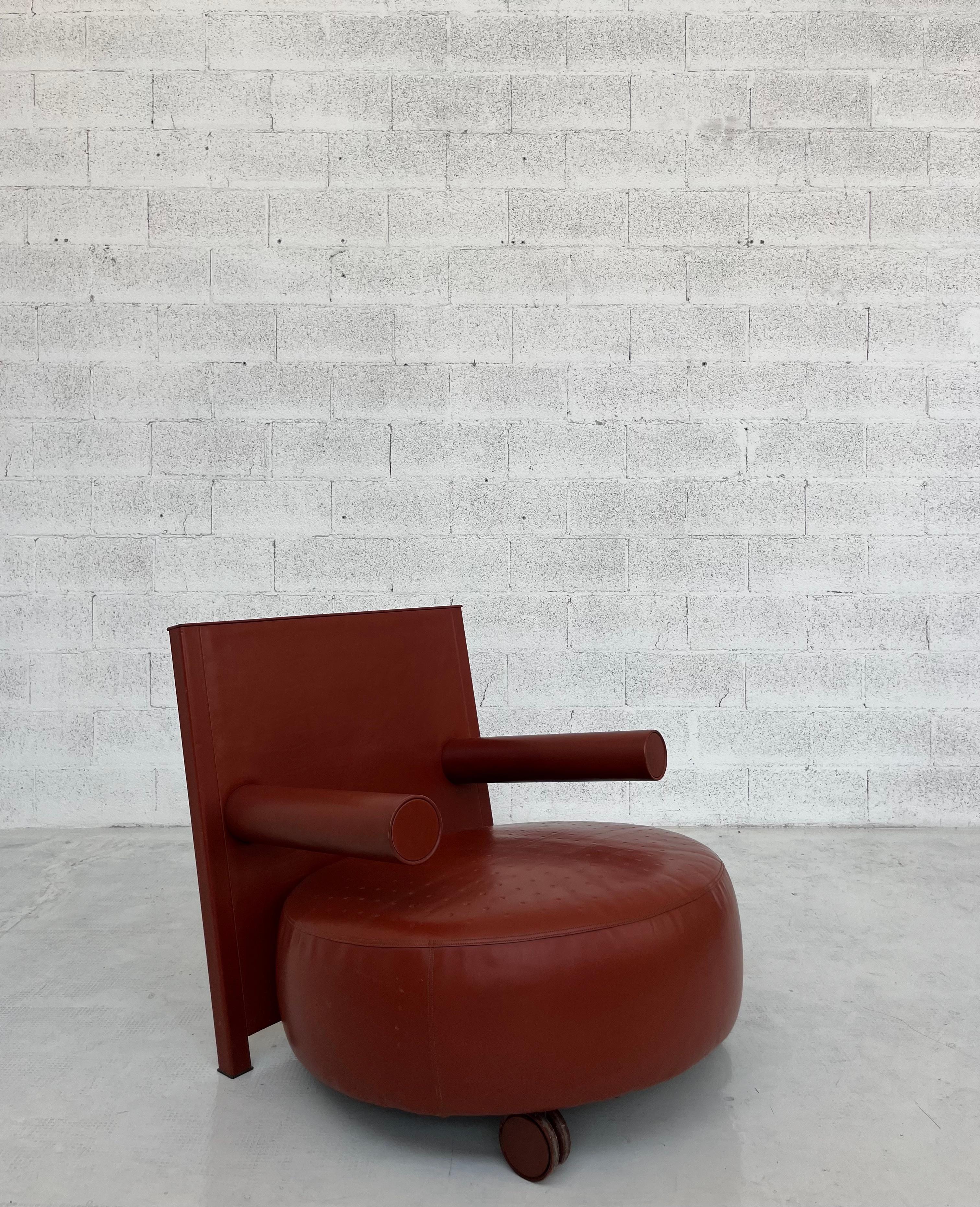 Outstanding leather armchair Baisity model designed by Antonio Citterio at the end of 80s.
Beautiful and comfortabel seating. 
The chair has two wheel upfront so it can easily moved to another position in your room.
Very good condition