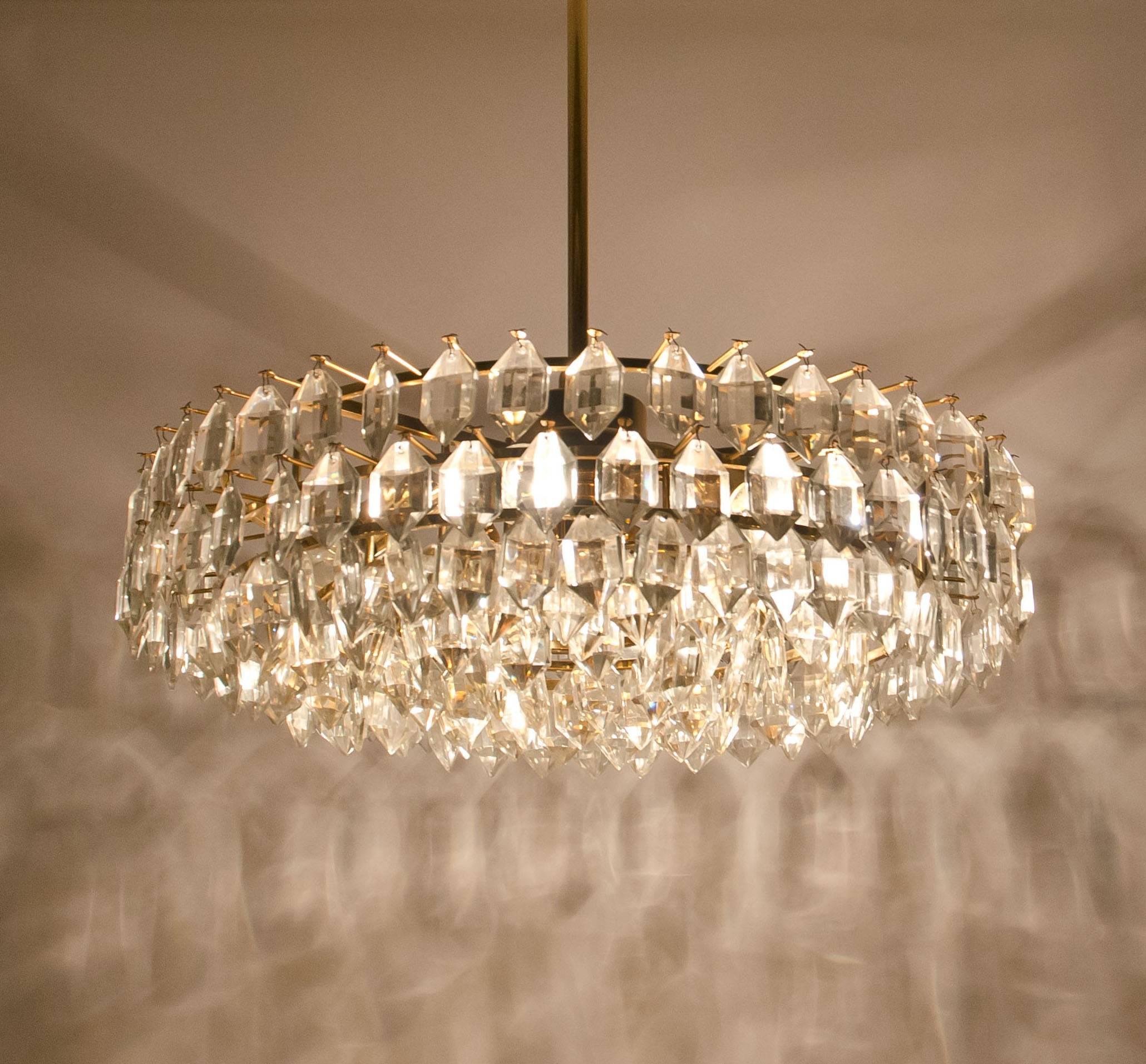 Stunning chandelier by Bakalowits and Sohne with huge gem-like crystals and brass frame. The chandelier is fitted with 6 E14 bulbs 25 watts each. Best of design from the 1950s From Vienna, Austria. The chandeliers from Bakalowits are executed to a