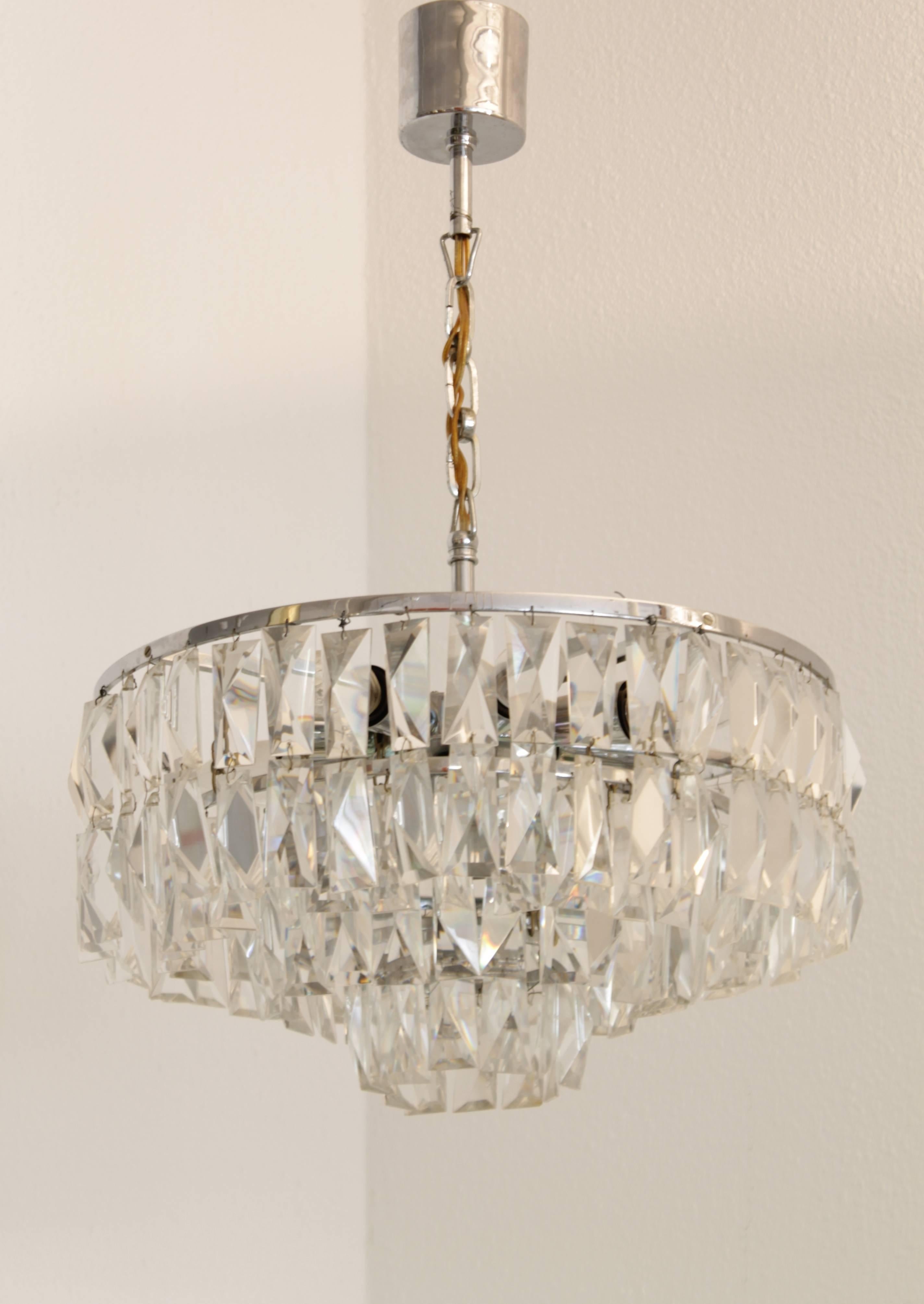 Crystal and chrome chandelier made by Bakalowits and Sohne, Austria, circa 1960s.
2 chandeliers available.