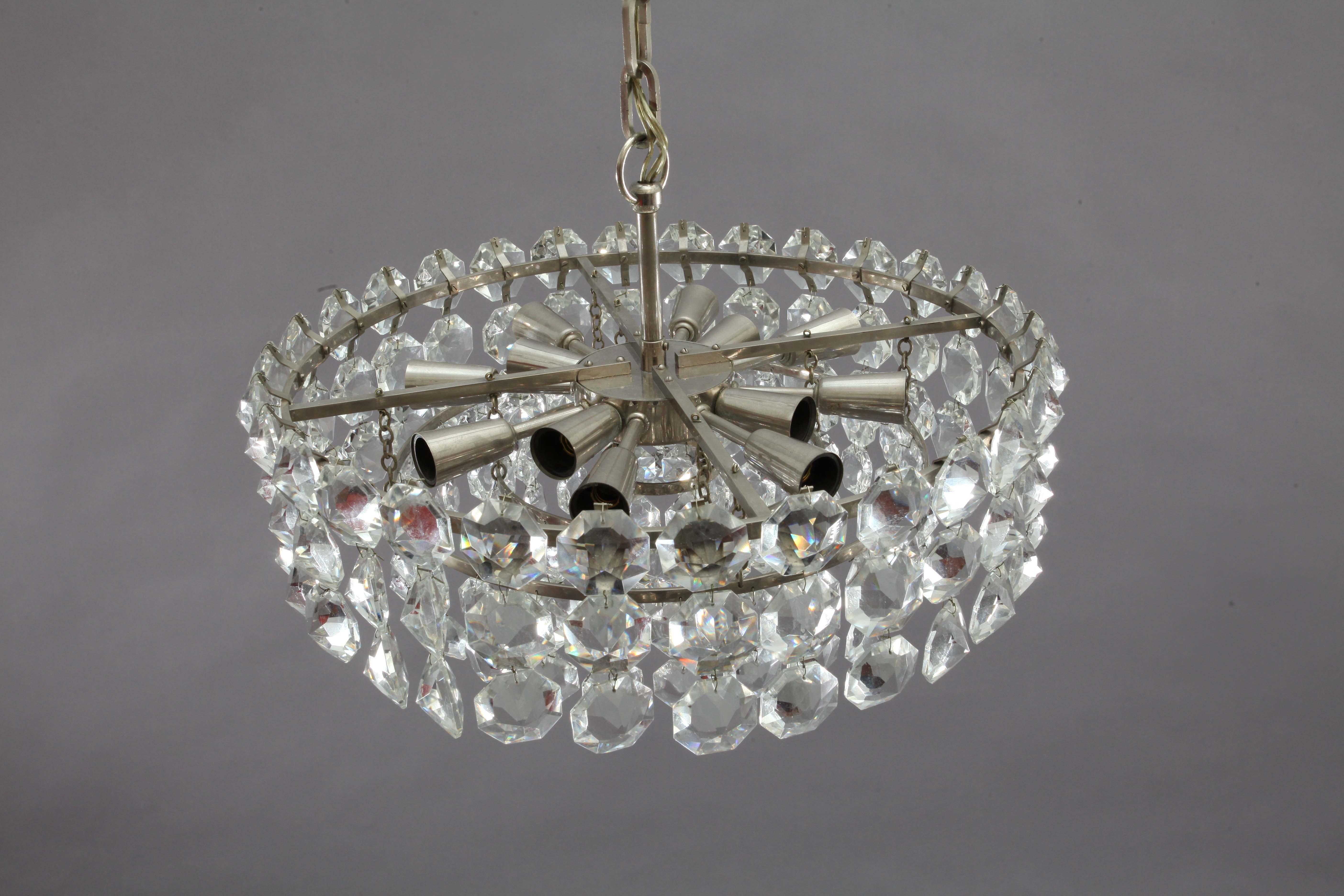 Bakalowits chandelier 
Austria, 1960, 
Diamond cut crystal on a chrome frame
12 bulb sockets E 14.


