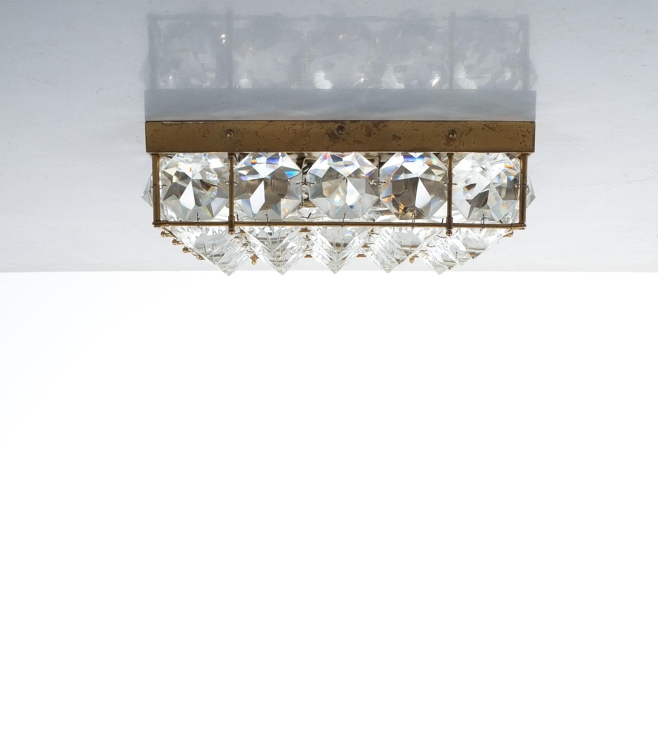 Attributed to Bakalowits flush mount from brass glass, Austria, circa 1955. Rectangular ceiling fixture or large wall light comprised of brass and large diamond-shaped cut glass pieces. The lamp has been cleaned and rewired otherwise in good vintage