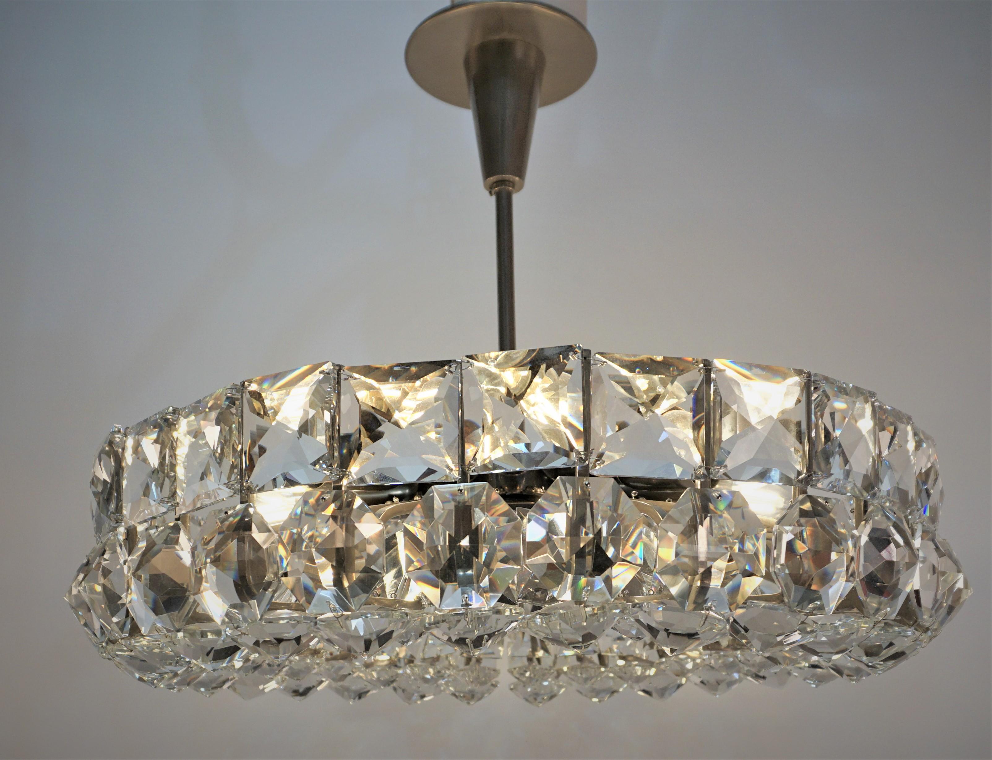 Sparkling like white large diamond 1960 crystal chandelier with nickel on bronze frame.
Sixteen lights, 60 watts max each.
Professionally rewired and ready for installation.