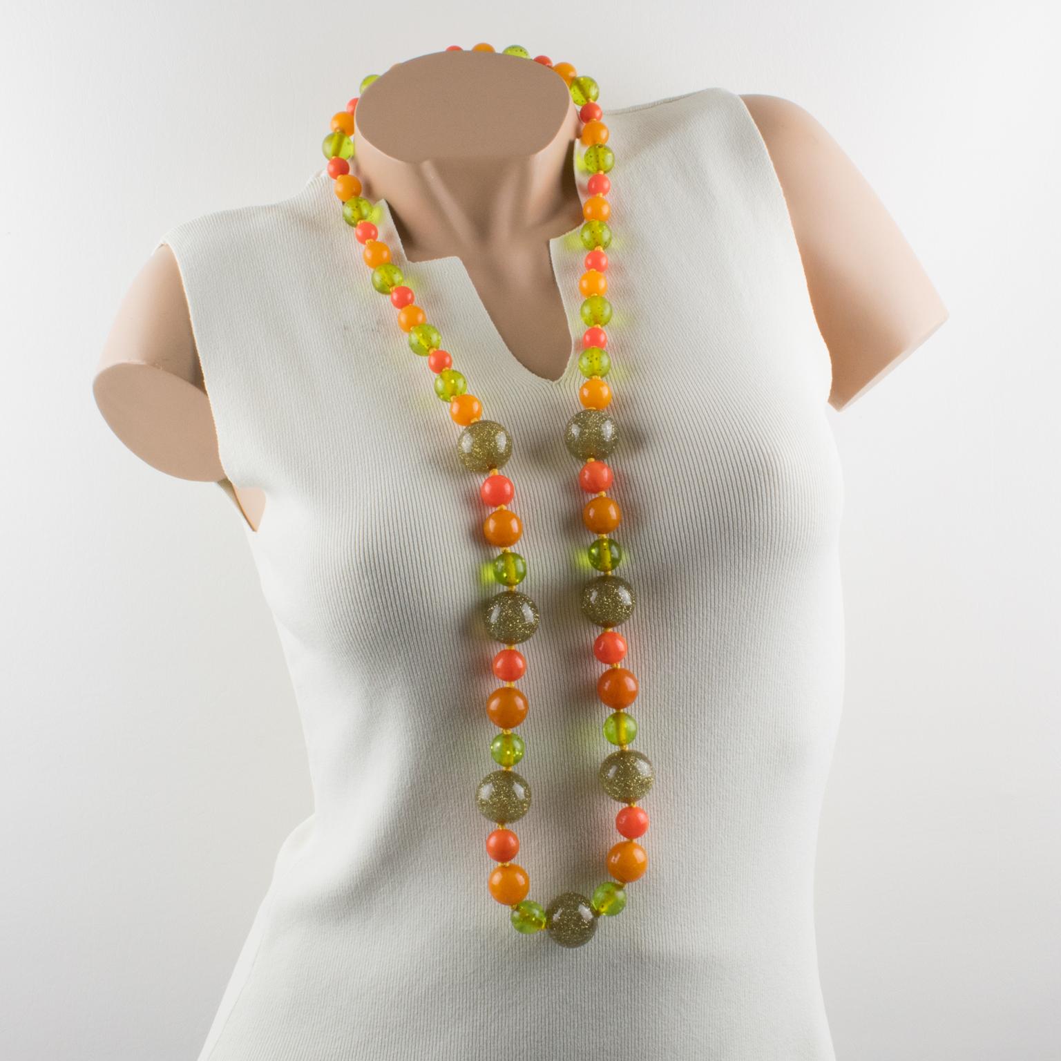 Art Deco Bakelite and Lucite Extra Long Necklace with Orange, Green and Glitter Beads For Sale