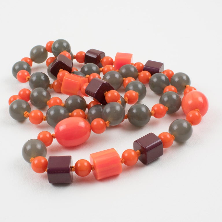 Bakelite and Lucite Necklace Tequila Pink and Gray For Sale at 1stDibs