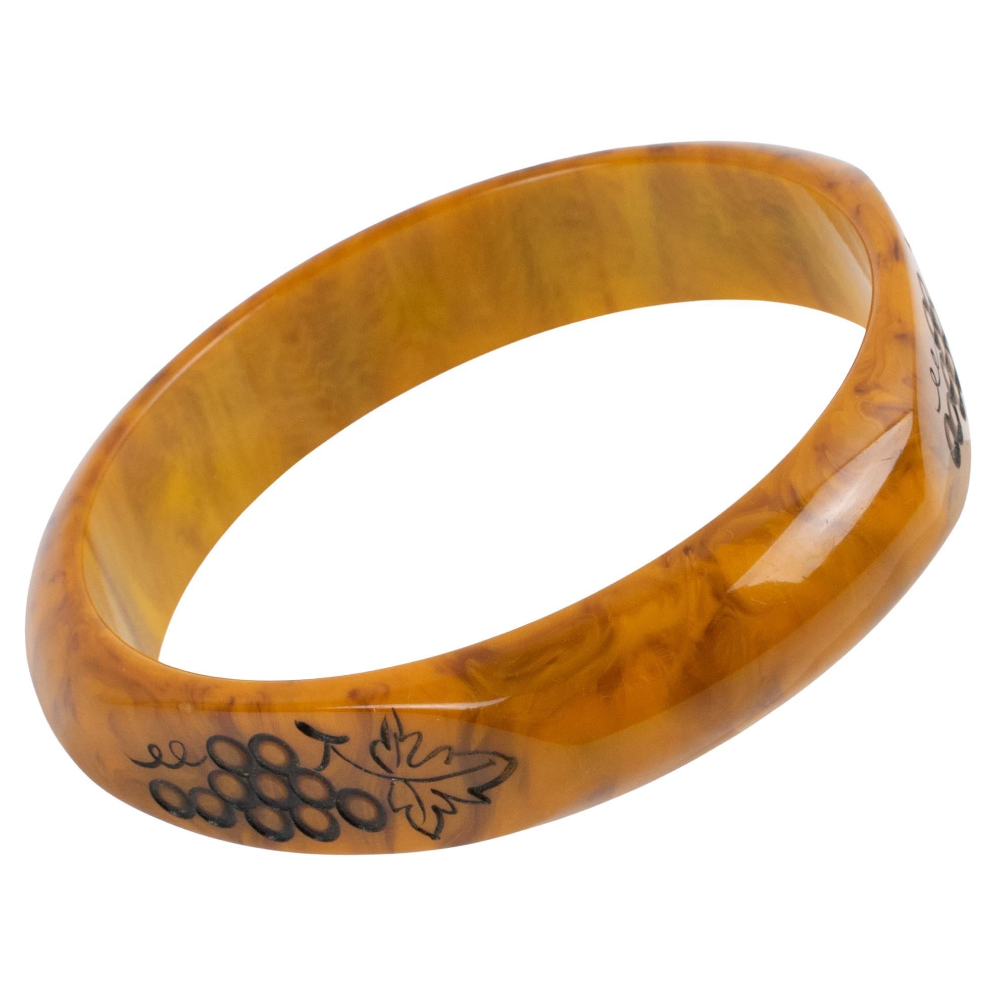 Bakelite Bracelet Bangle Butterscotch with Vine Carving For Sale
