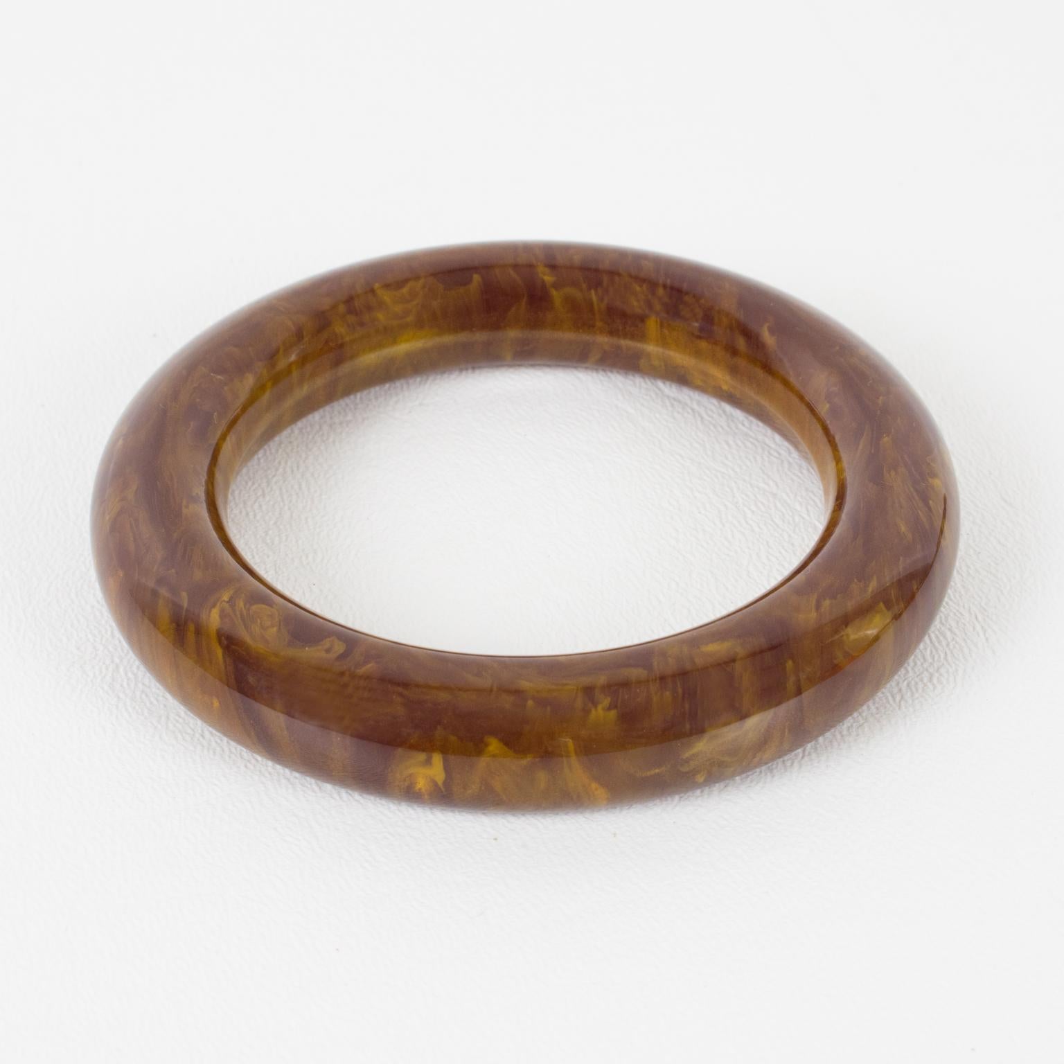 Lovely purple stardust marble Bakelite bracelet bangle. Chunky tube shape with intense purple marble tone with cloudy white swirling and gold flakes inclusions. 
Measurements: Inside across is 2.50 in. diameter (6.4 cm) - outside across is 3.57 in.