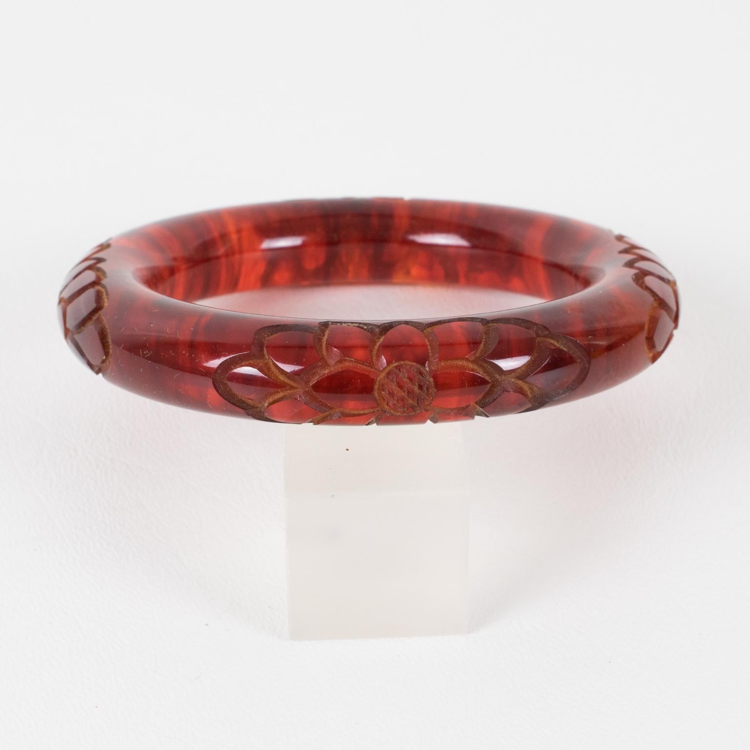 Art Deco Bakelite Carved Bracelet Bangle in Cloudy Red Tea Amber Color For Sale