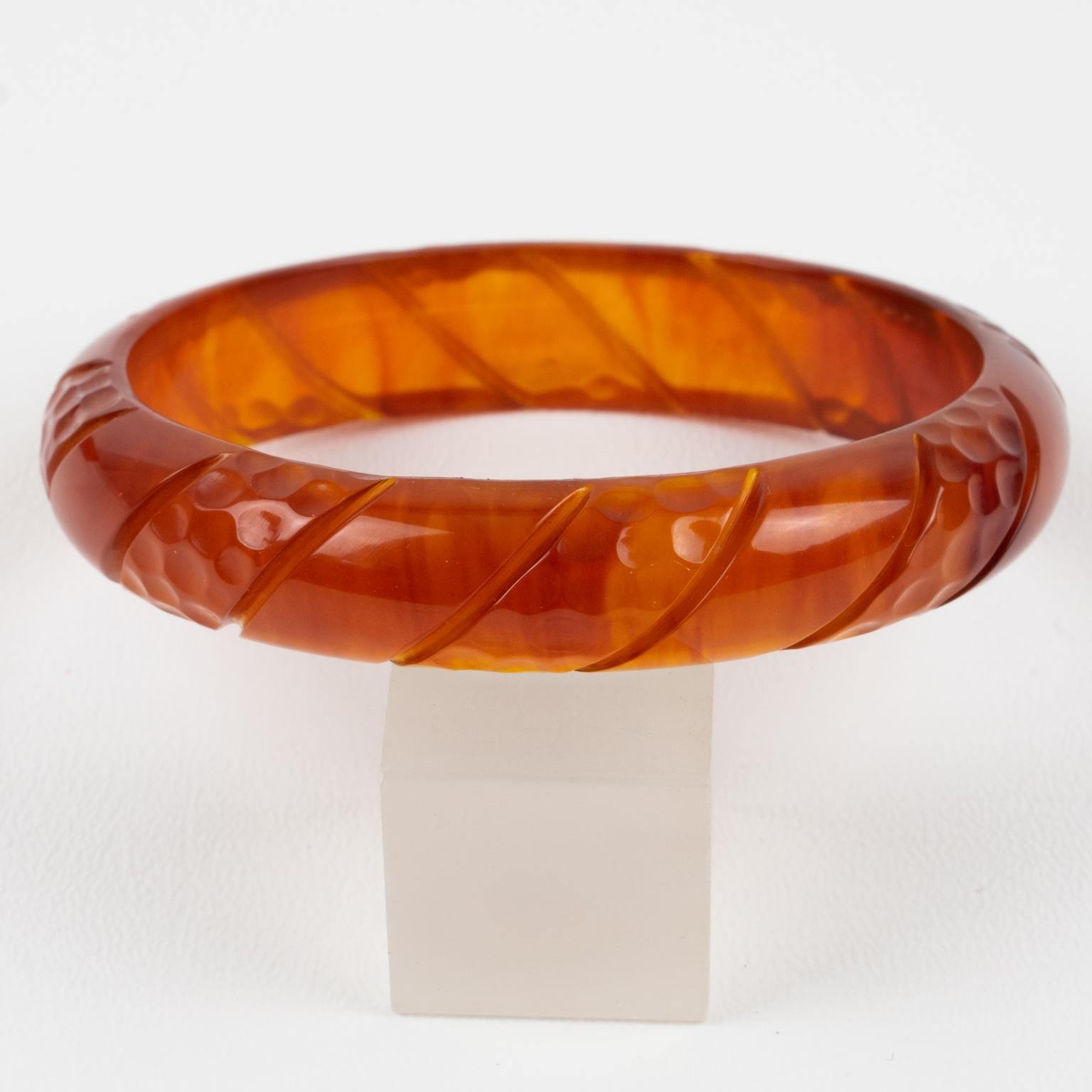 Art Deco Bakelite Carved Bracelet Bangle Translucent Red Tea Amber Marble For Sale