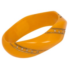 Bracelet en bakélite sculpté en caramel avec strass