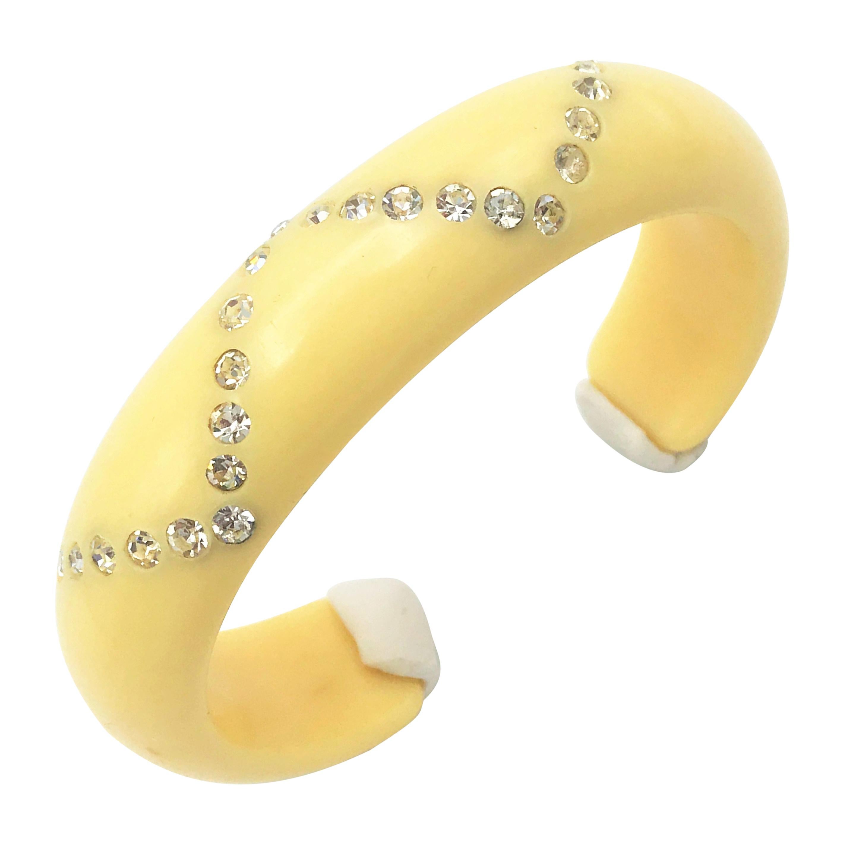 Bakelite ivory-colored open bangle set with clear rhinestones USA 