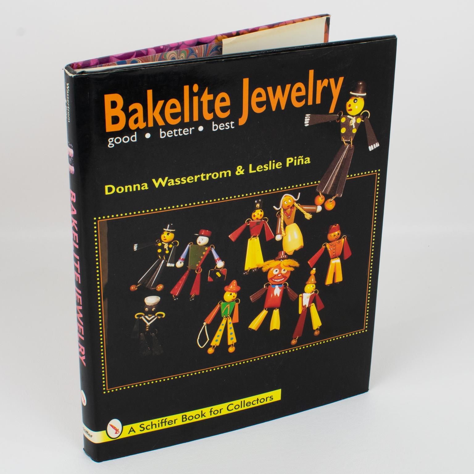 Bakelite Jewelry, Good - Better - Best, English book by Donna Wassertrom and Leslie Pina, 1997.
Bakelite jewelry was popular during The Depression because it was decorative, fun, and very affordable. Today, it is sought after and worn for the same