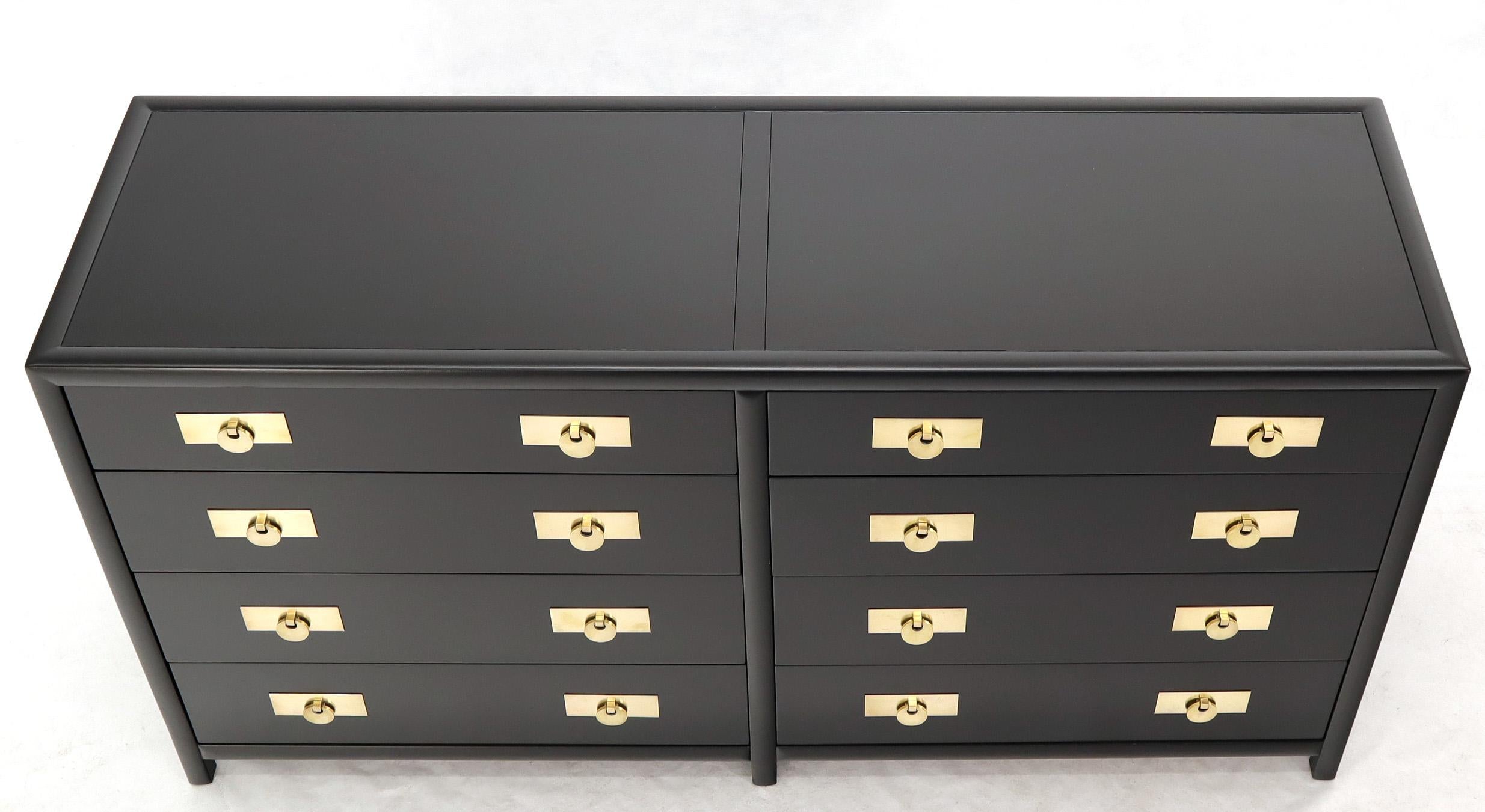 black and brass dresser