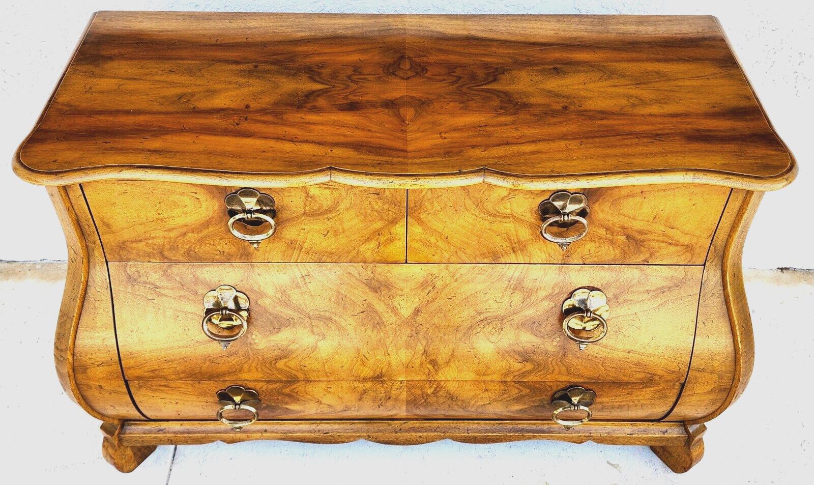 For FULL item description click on CONTINUE READING at the bottom of this page.
Offering One Of Our Recent Palm Beach Estate Fine Furniture Acquisitions Of A
Fantabulous Burl and Walnut Bombay Commode Chest by Baker Furniture

Approximate