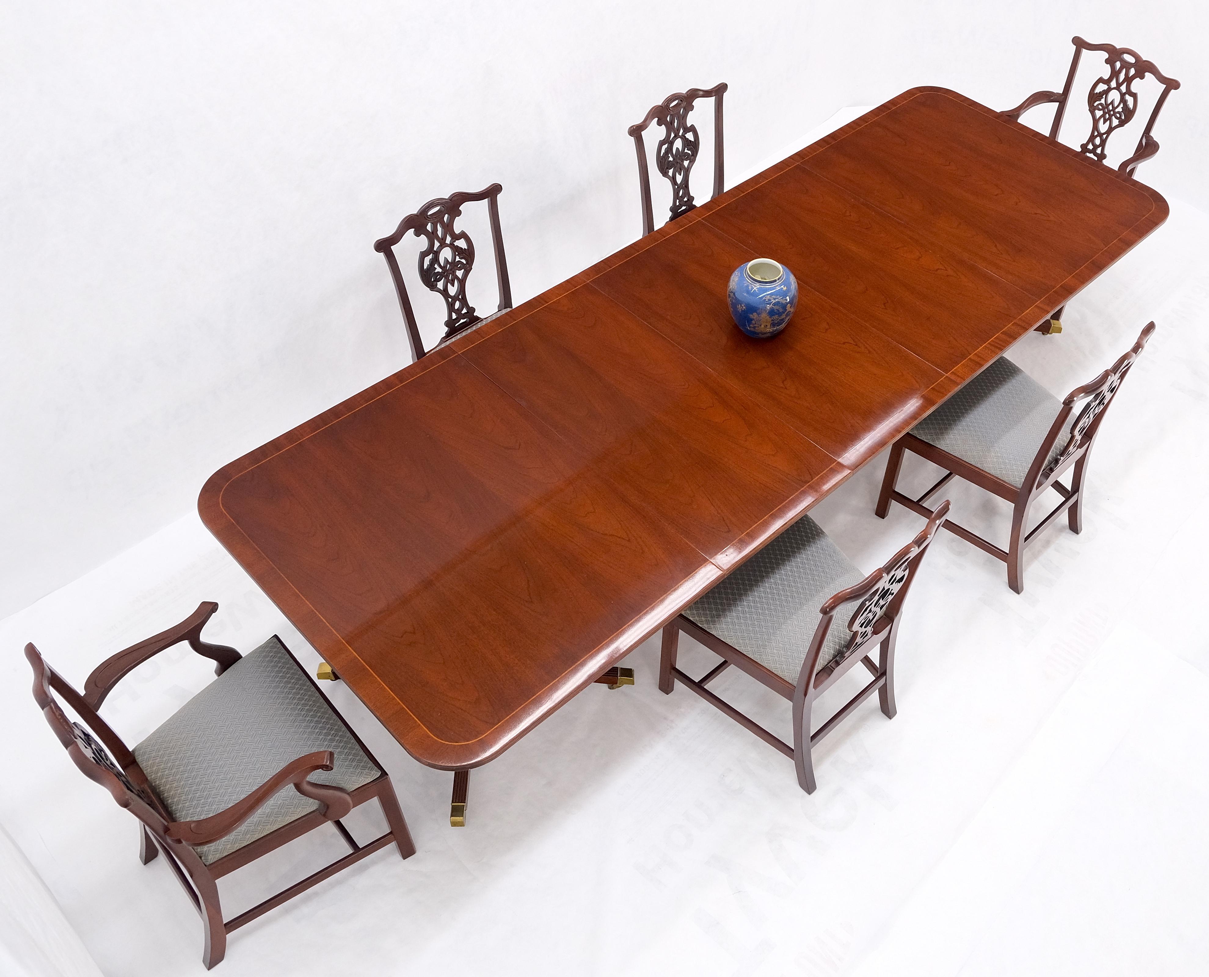 Baker Charleston Collection double pedestal mahogany banded dining table w/ 3 extension leaves 6 chairs set.

Chair: 19 × 22 x 38 inches
Seat: 19 inches

Table: 46 x 68 × 30 inches
Leaf: (3) 20 inches across.