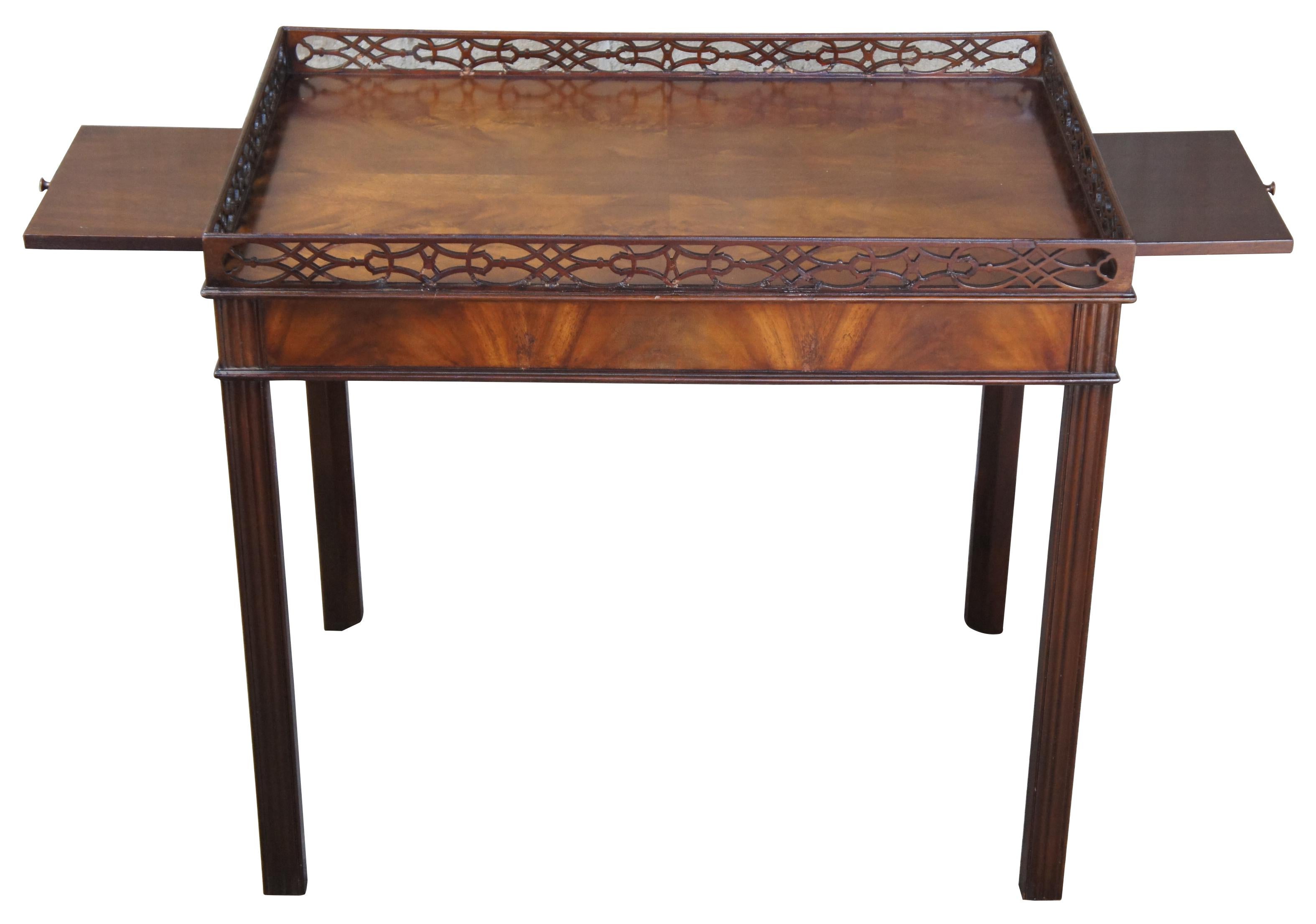 Baker Collectors edition Chippendale style mahogany tea tray table parlor accent

The Collectors edition by Baker Furniture is inspired by iconic Chippendale styling with a raised gallery of carved fretwork over a matchbook veneered top. Features