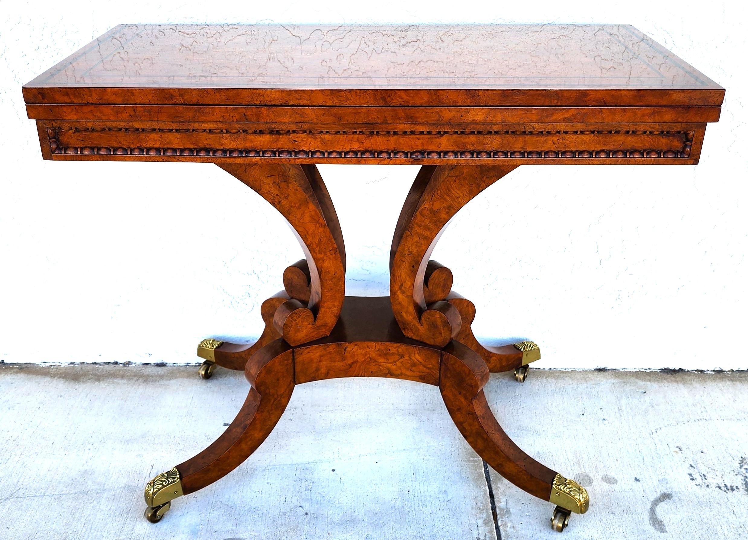 For FULL item description click on More Details Below.

Offering One Of Our Recent Palm Beach Estate Fine Furniture Acquisitions Of A
Baker Flip Top Rolling Tooled Leather Top Game or Console Table with Storage

Approximate Measurements in Inches
28