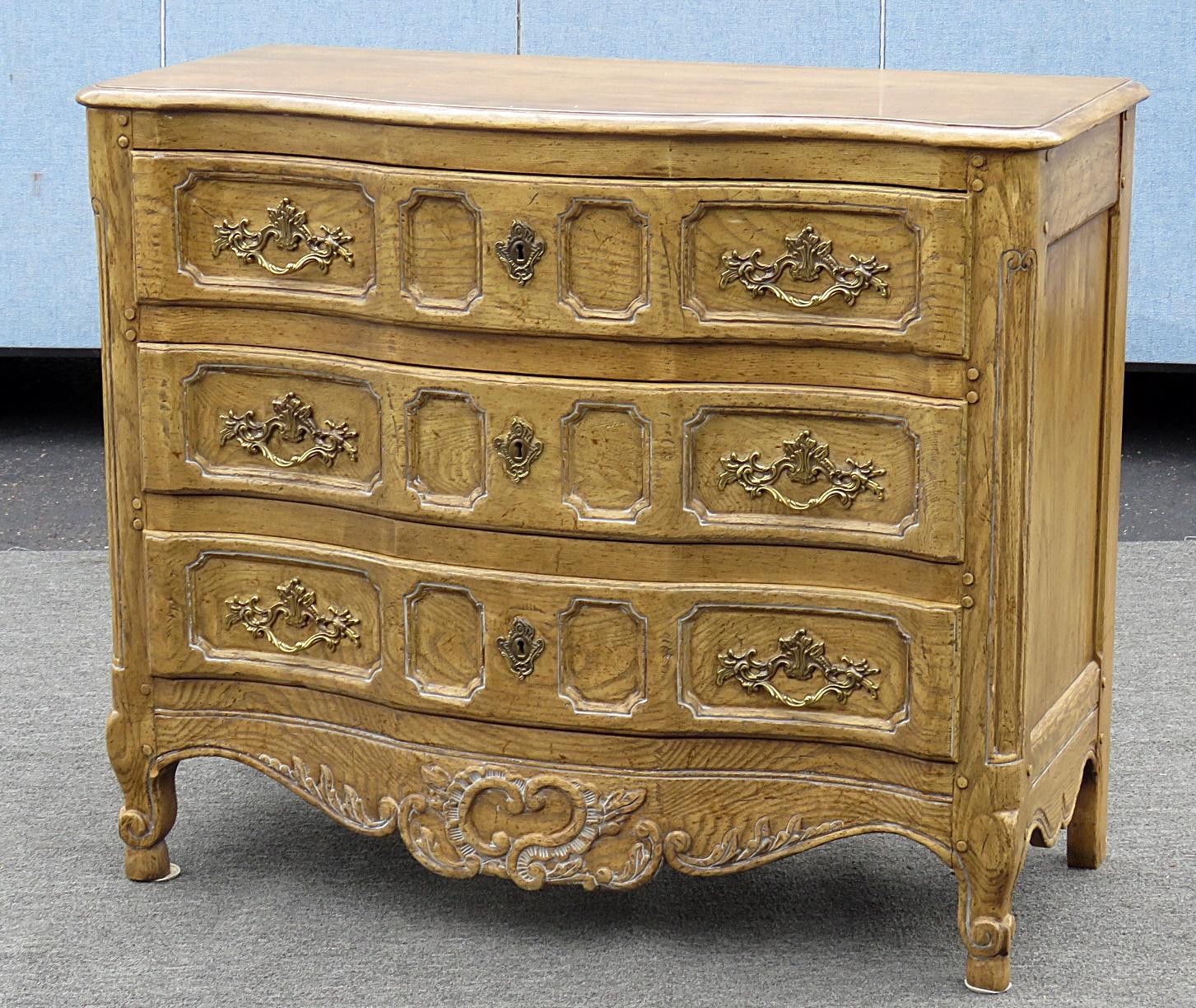 Baker country French three-drawer commode.