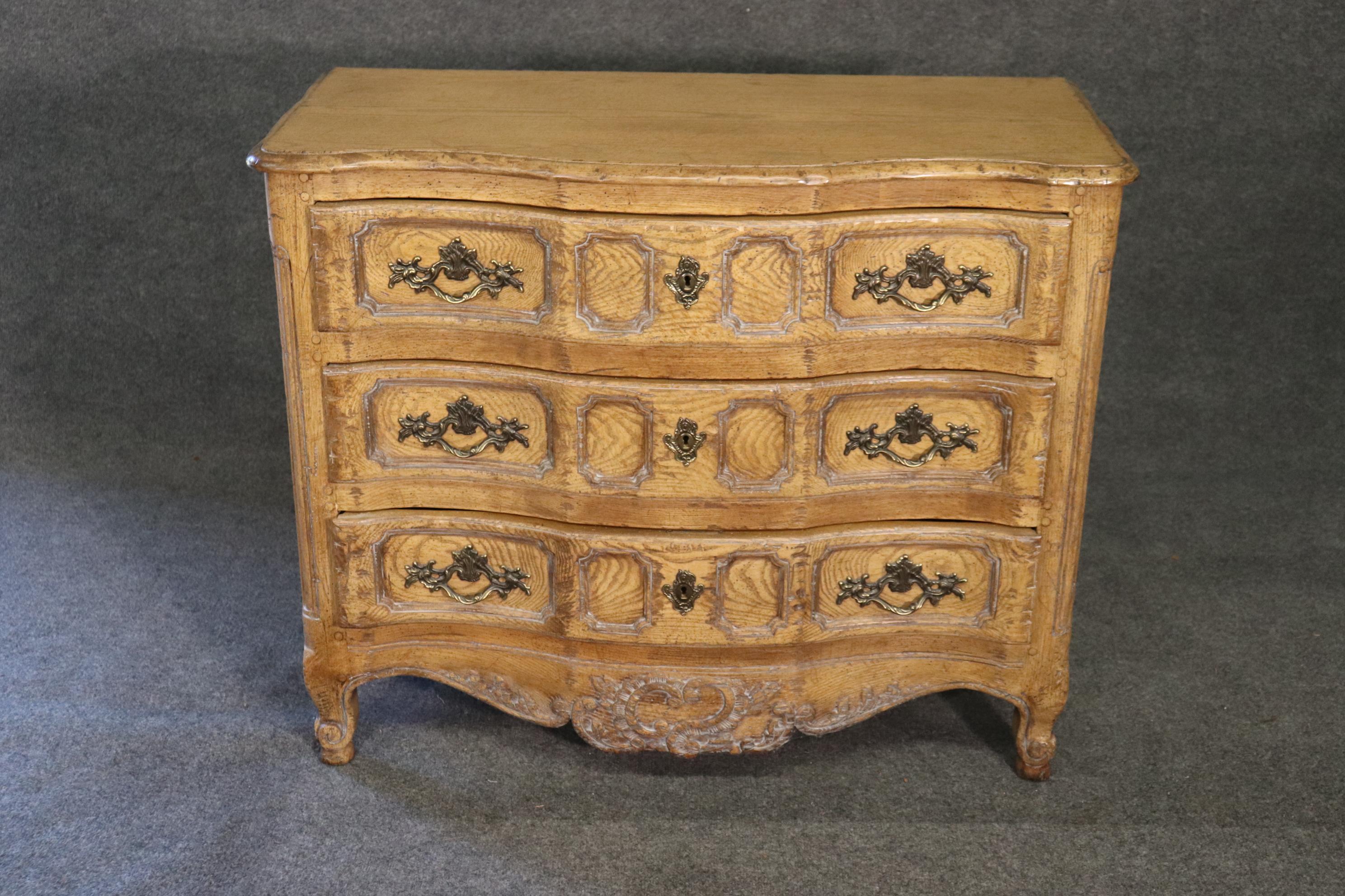 This is a gorgeous Piere Deux style commode from Baker furniture. The commode is extremely clean and needs nothing to be enjoyed today. The commode is made with a scrubbed oak finish and looks like its 200 years old. The piece measures 39 wide x 19