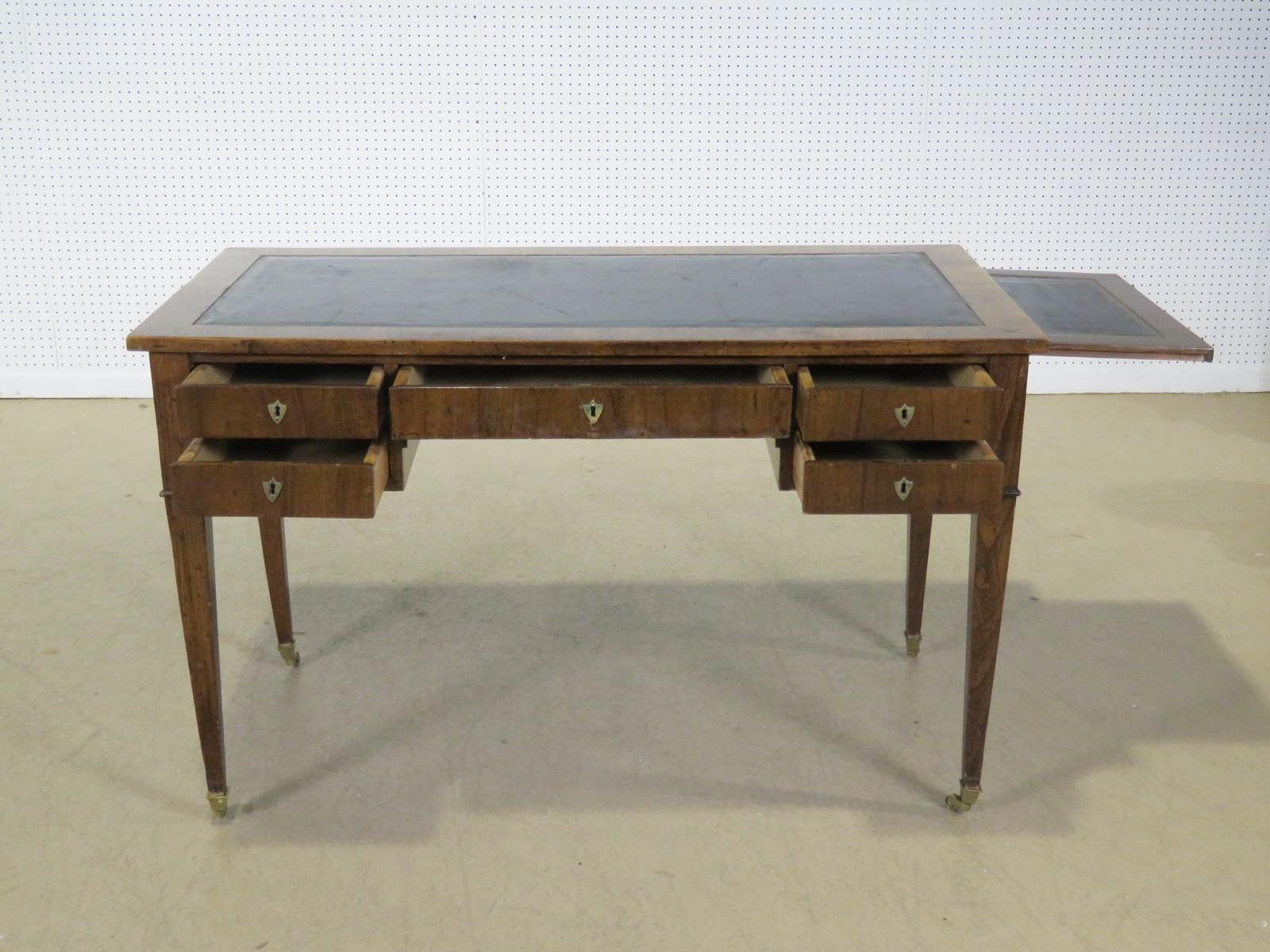 Baker Directoire style 5-drawer leather top writing desk with pull out writing surfaces. The desk is 72