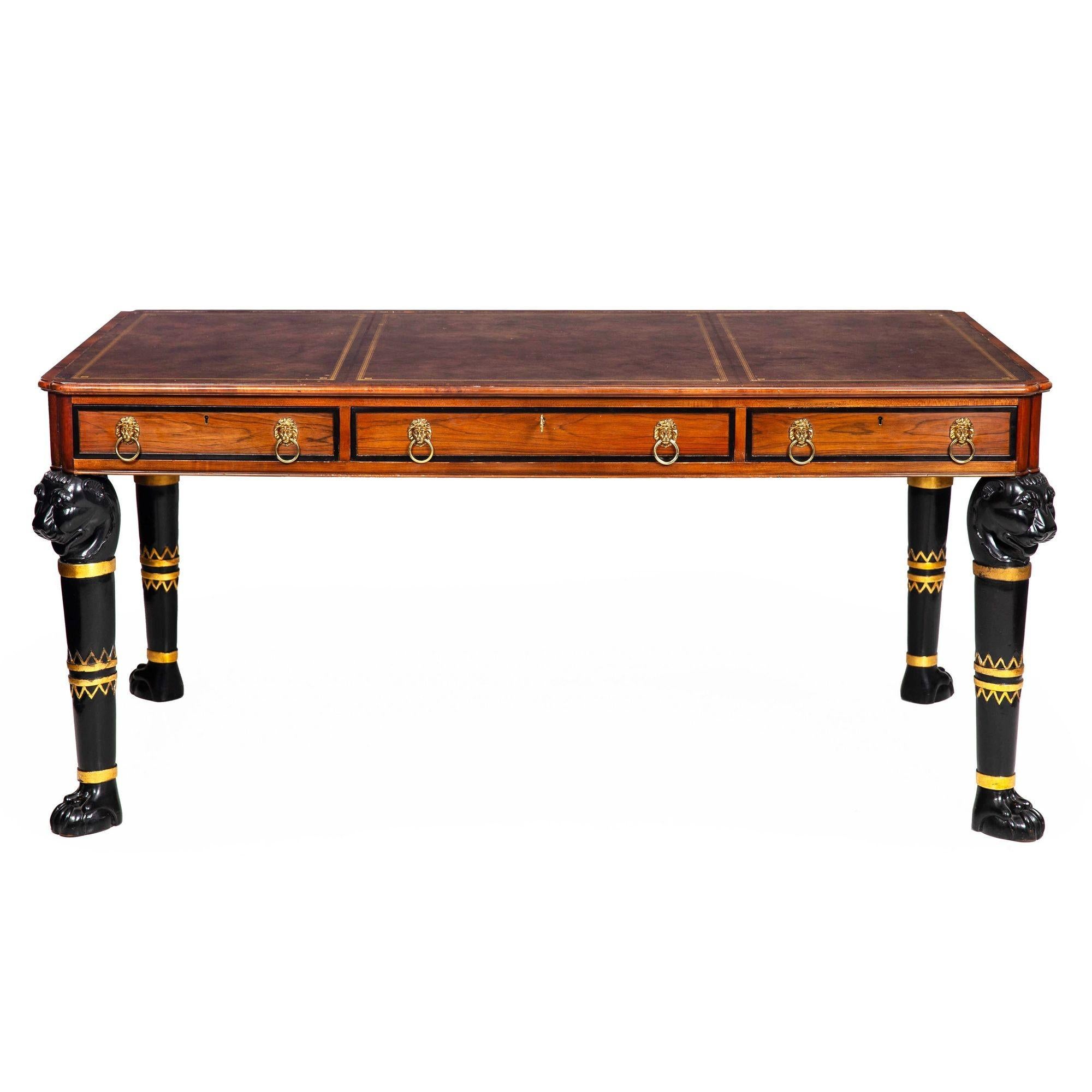 EGYPTIAN REVIVAL STYLE ROSEWOOD AND LEATHER WRITING DESK
Baker, United States  with original silver plaque inside drawer  late 20th/early 21st century
Item # 407ENV09Q

A lovely example of Baker's Egyptian Revival writing desk modeled after the
