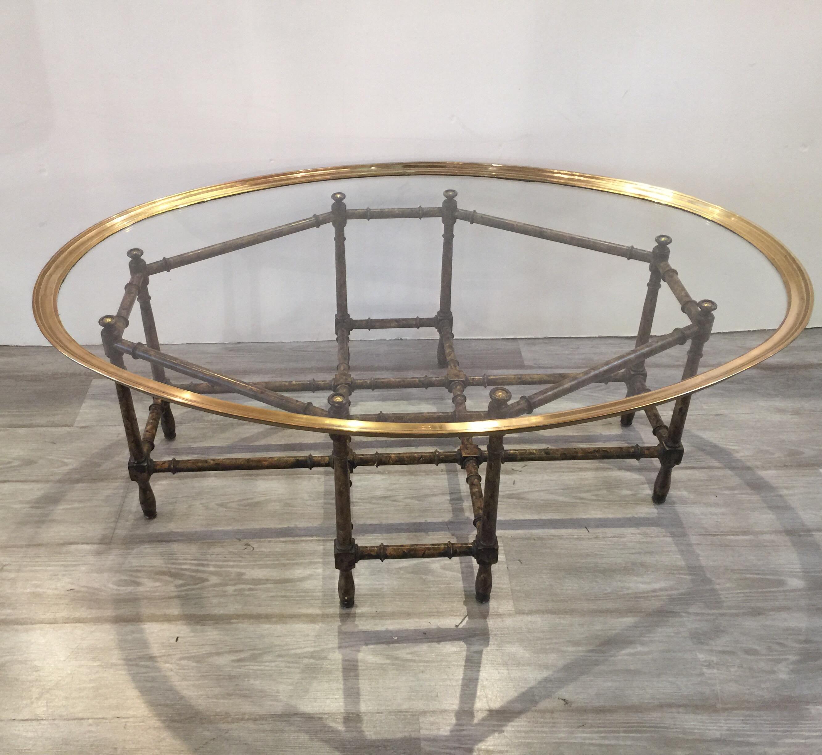 Baker faux bamboo/tortoise cocktail or coffee table with brass and glass top, top lifts off for easy moving and cleaning.
 