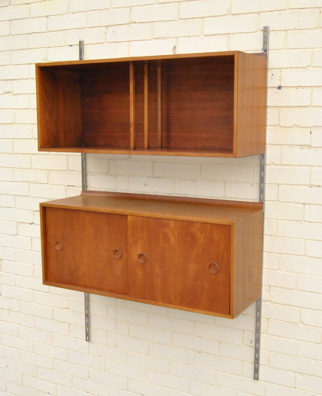 Baker Finn Juhl adjustable modular wall unit, circa 1950s. Can be positioned vertically or horizontal. Each unit measures 32