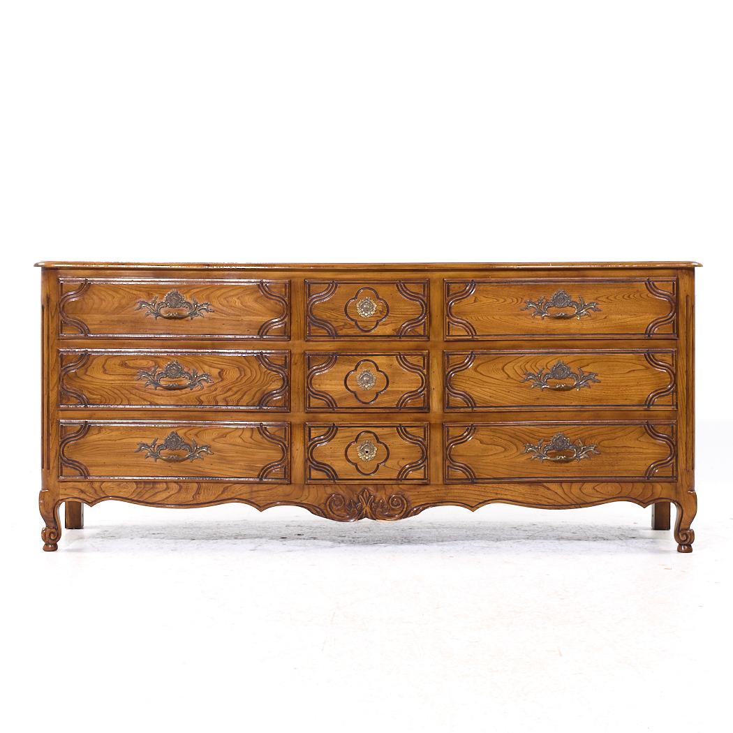 Baker French Louis XV Style Oak and Burlwood Bombe Chest Lowboy Dresser

This lowboy measures: 76 wide x 20 deep x 32.75 inches high

We take our photos in a controlled lighting studio to show as much detail as possible. We do not Photoshop out