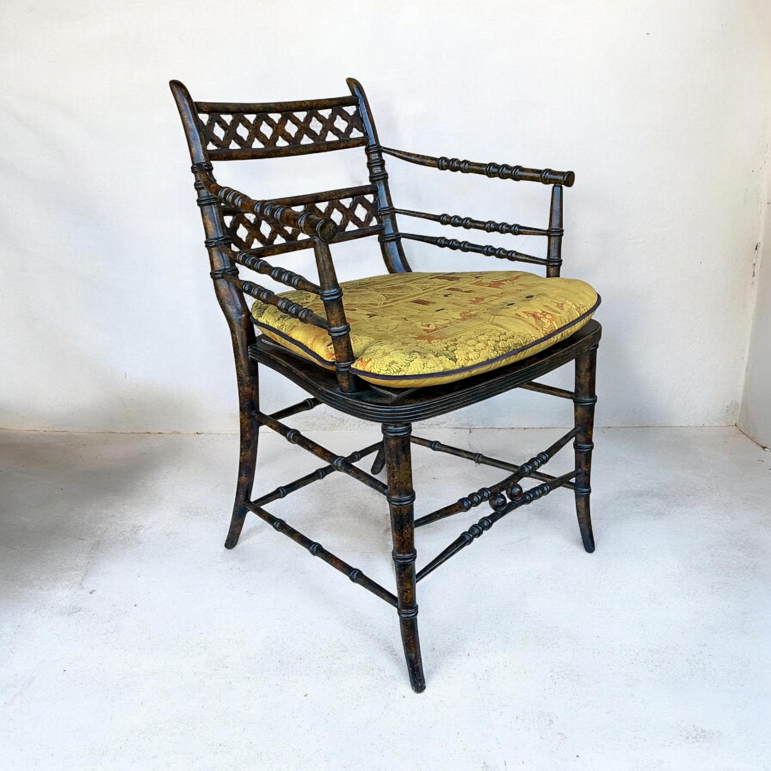This is a wonderful regency style faux bamboo bergere chair by Baker Furniture. It has a faux tortoise finish and loose chinoiserie cushion. It is marked. 

Shipping can run two to five weeks.