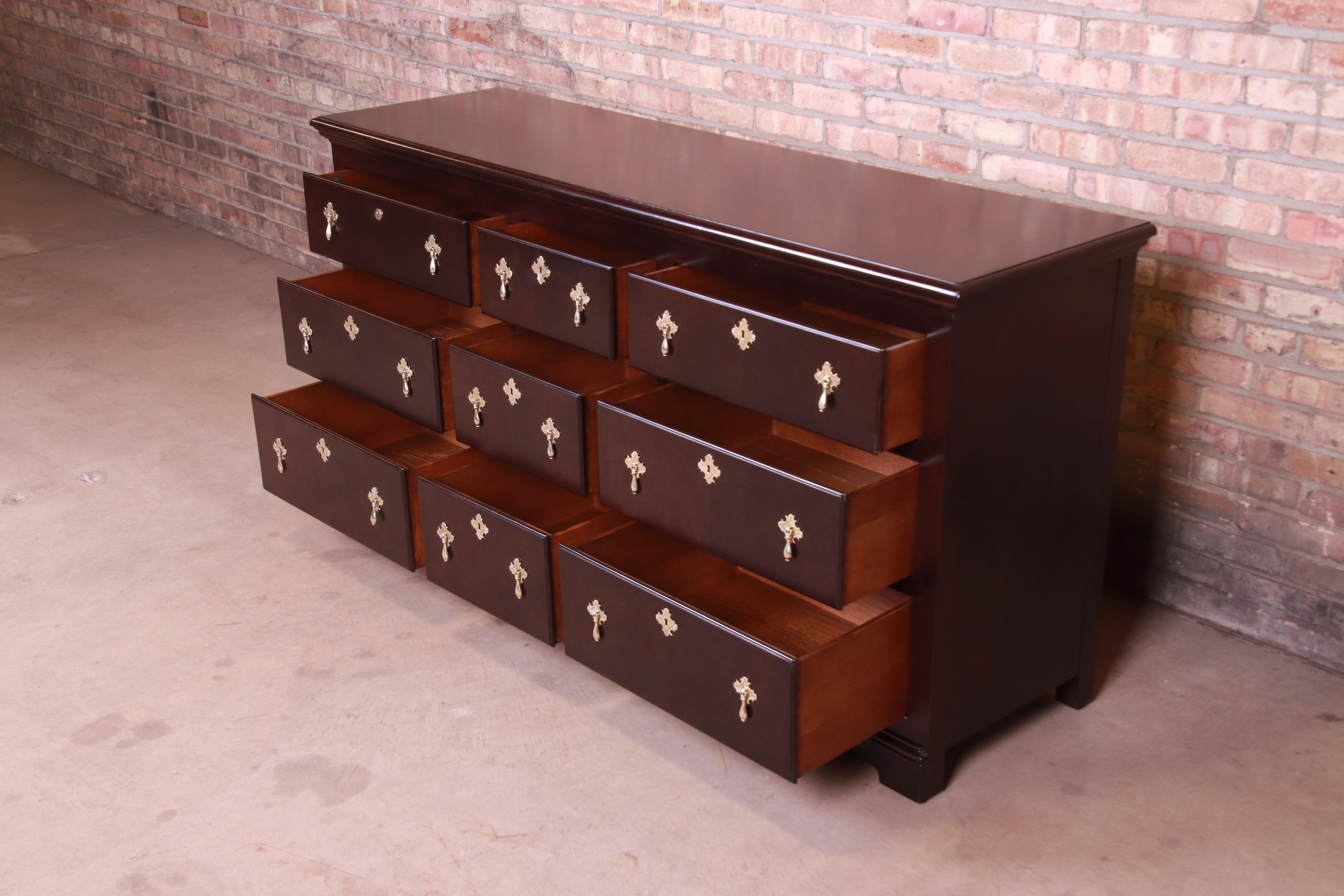 British Colonial Baker Furniture 18th Century Flemish Style Mahogany Triple Dresser, Refinished For Sale