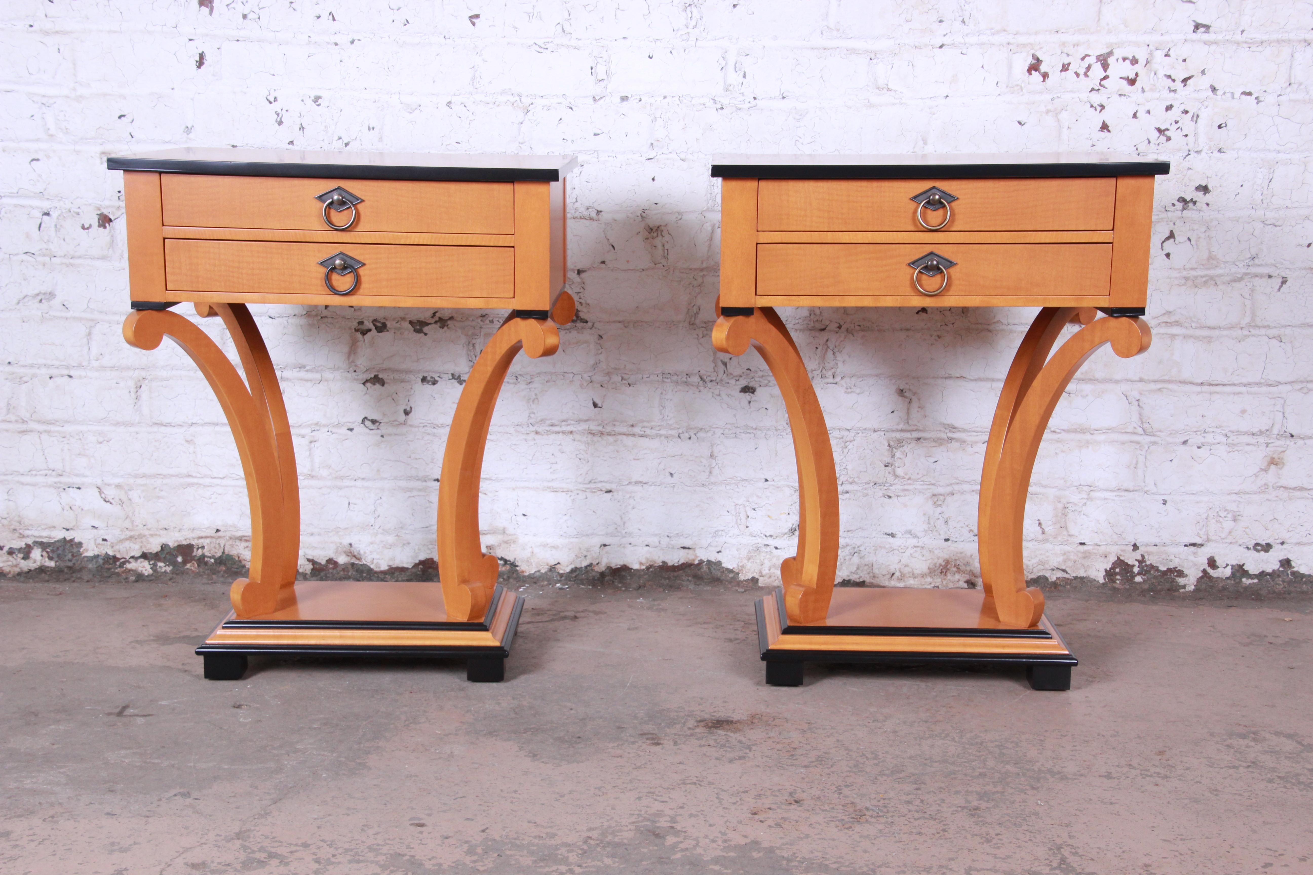 An exceptional pair of Biedermeier style nightstands or end tables

By Baker Furniture

USA, circa 1980s

Primavera wood and parcel ebonized, with original brass hardware.

Measures: 25
