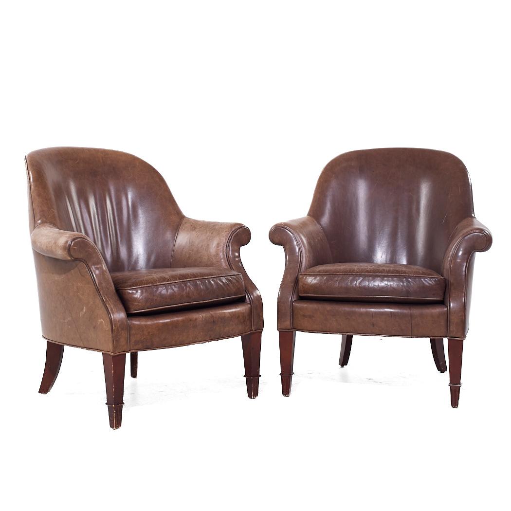 Baker Furniture Brown Leather Barrel Club Lounge Chairs

Each lounge chair measures: 33 wide x 33 deep x 37 high, with a seat height of 19 and arm height/chair clearance 25.5 inches

We take our photos in a controlled lighting studio to show as much